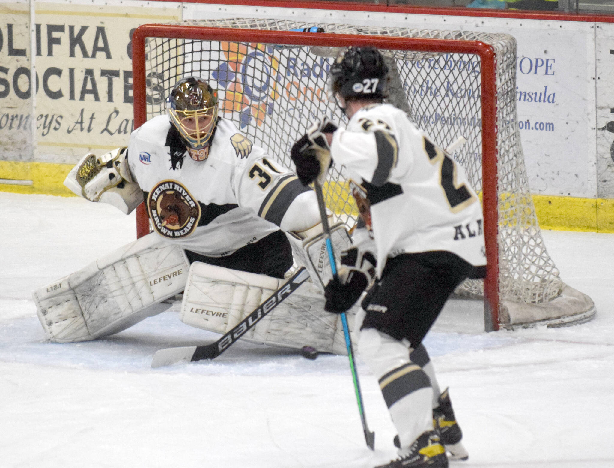 Kenai River Brown Bears goaltender Tommy Aitken makes a save against the Chippewa (Wisconsin) Steel on Friday, Oct. 21, 2021, at the Soldotna Regional Sports Complex in Soldotna, Alaska. (Photo by Jeff Helminiak/Peninsula Clarion)