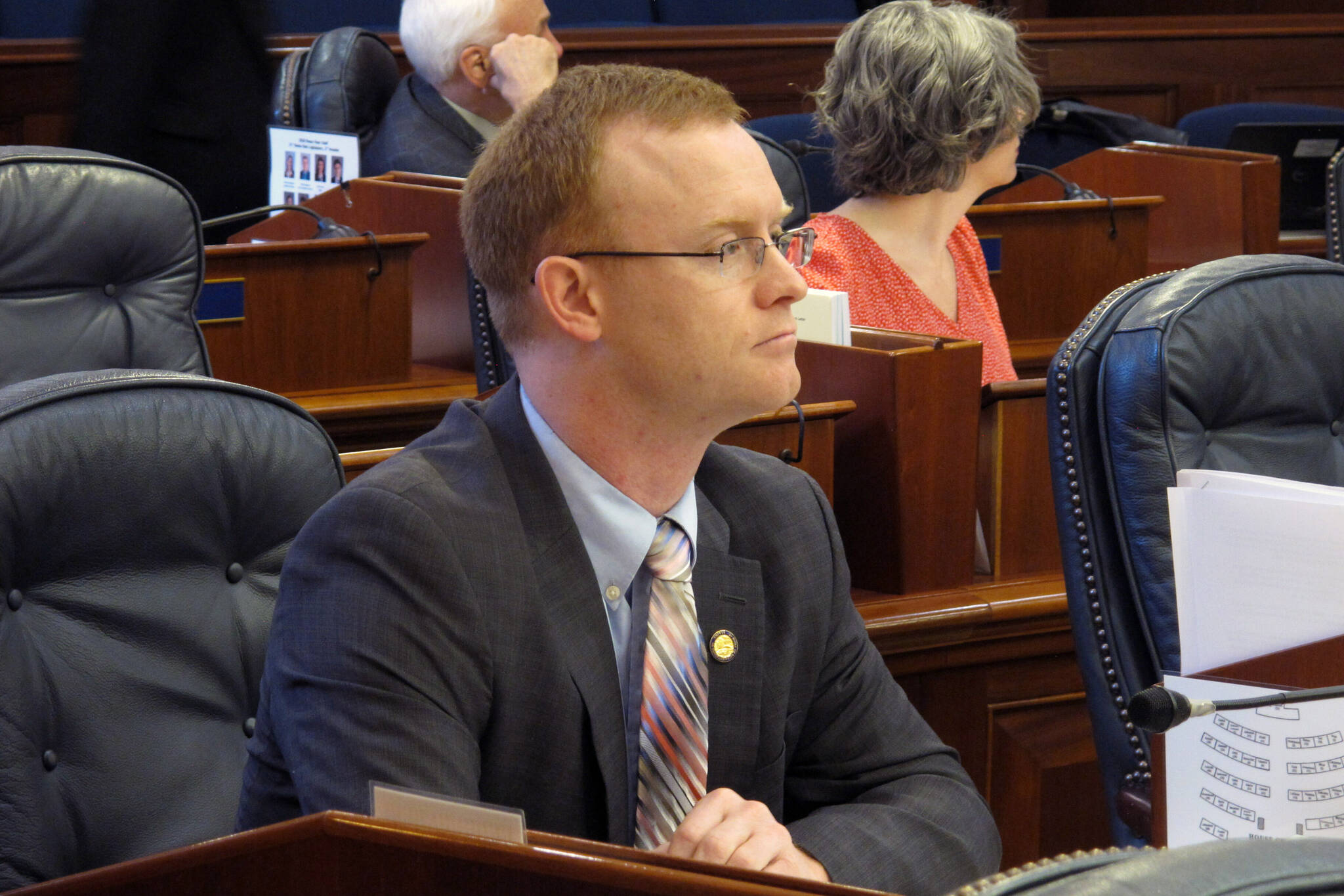 Alaska Rep. David Eastman, a Republican from Wasilla, sits at his desk on the Alaska House floor in Juneau, Alaska, on March 5, 2020. Alaska lawmakers are discussing whether to sanction Eastman who is also a member of the Oath Keepers far-right paramilitary organization according to the Anchorage Daily News. Eastman, who is a graduate of the U.S. Military Academy, confirmed with the Associated Press, Thursday, Jan. 27, 2022, that he joined the Oath Keepers a little over 12 years ago, “along with 38,000 others who have committed to honoring oaths we have taken.” (AP Photo/Becky Bohrer, File)