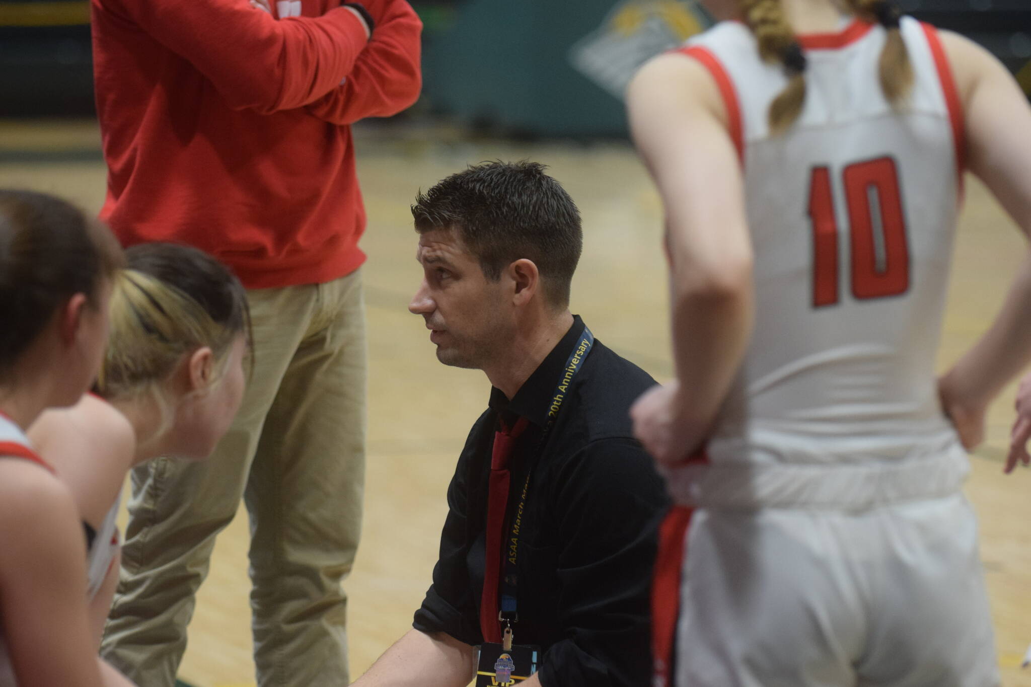 Kenai coach Jeff Swick calls a timeout during the Class 3A girls basketball fourth-place semifinals at the Alaska Airlines Center in Anchorage, Alaska, on Thursday, March 24, 2022. (Camille Botello/Peninsula Clarion)