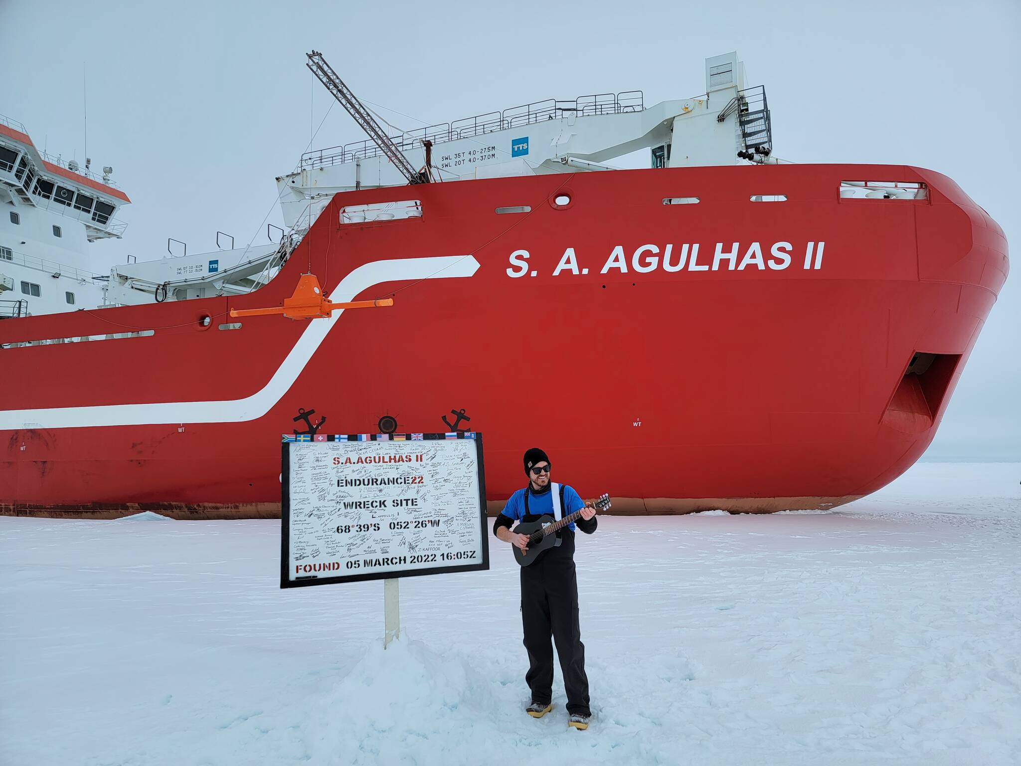 Courtesy photos / Michael Patz
Michael Patz, raised in Juneau, stands on the ice in front of the S.A. Agulhas II next to a sign showing the location of the wreck of Ernest Shackleton’s vessel, the Endurance, rediscovered by searchers aboard the icebreaker.