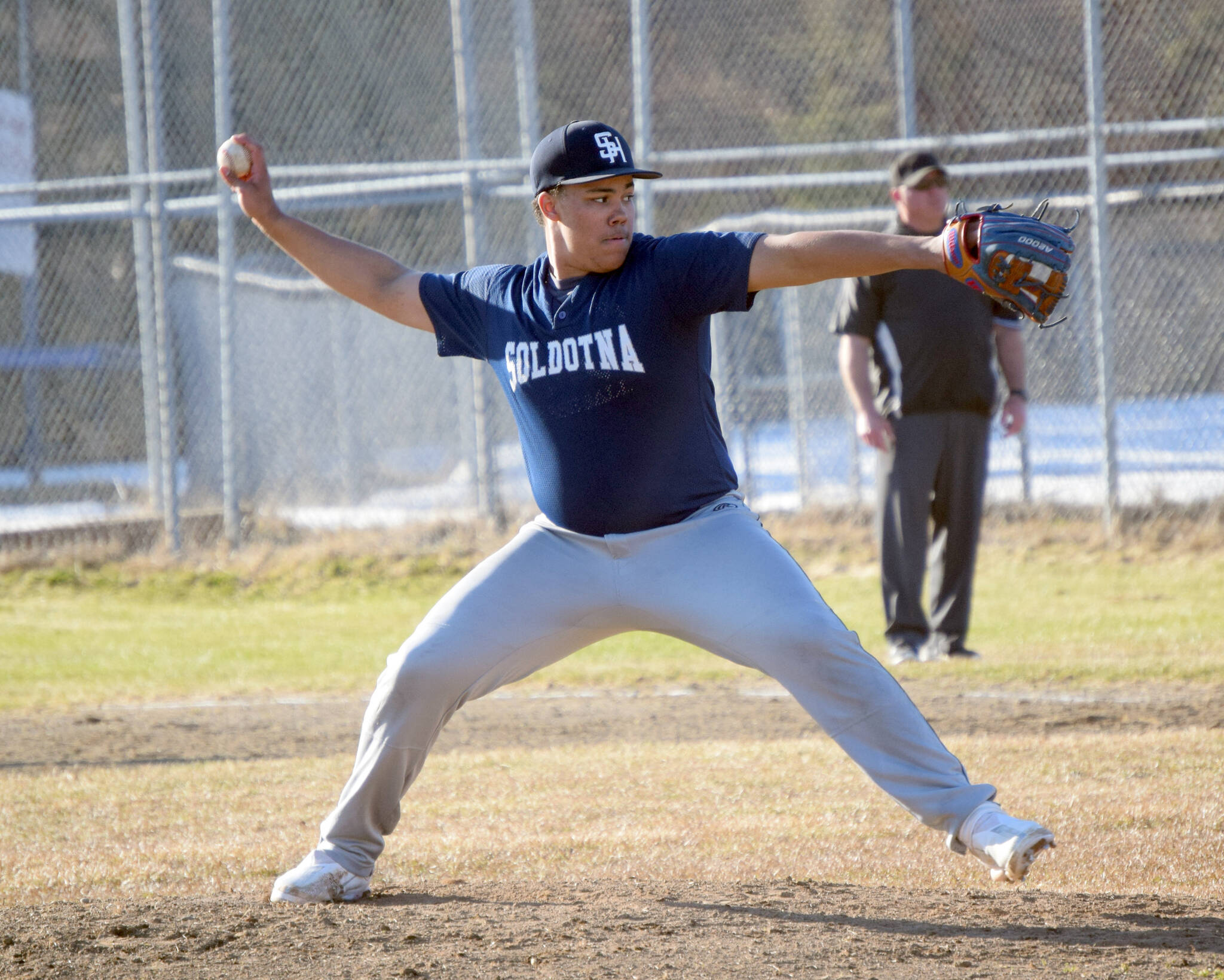 Soldotna starting pitcher Atticus Gibson delivers to Kenai Central on Tuesday, April 26, 2022, at the Kenai Little League Fields in Kenai, Alaska. (Photo by Jeff Helminiak/Peninsula Clarion)