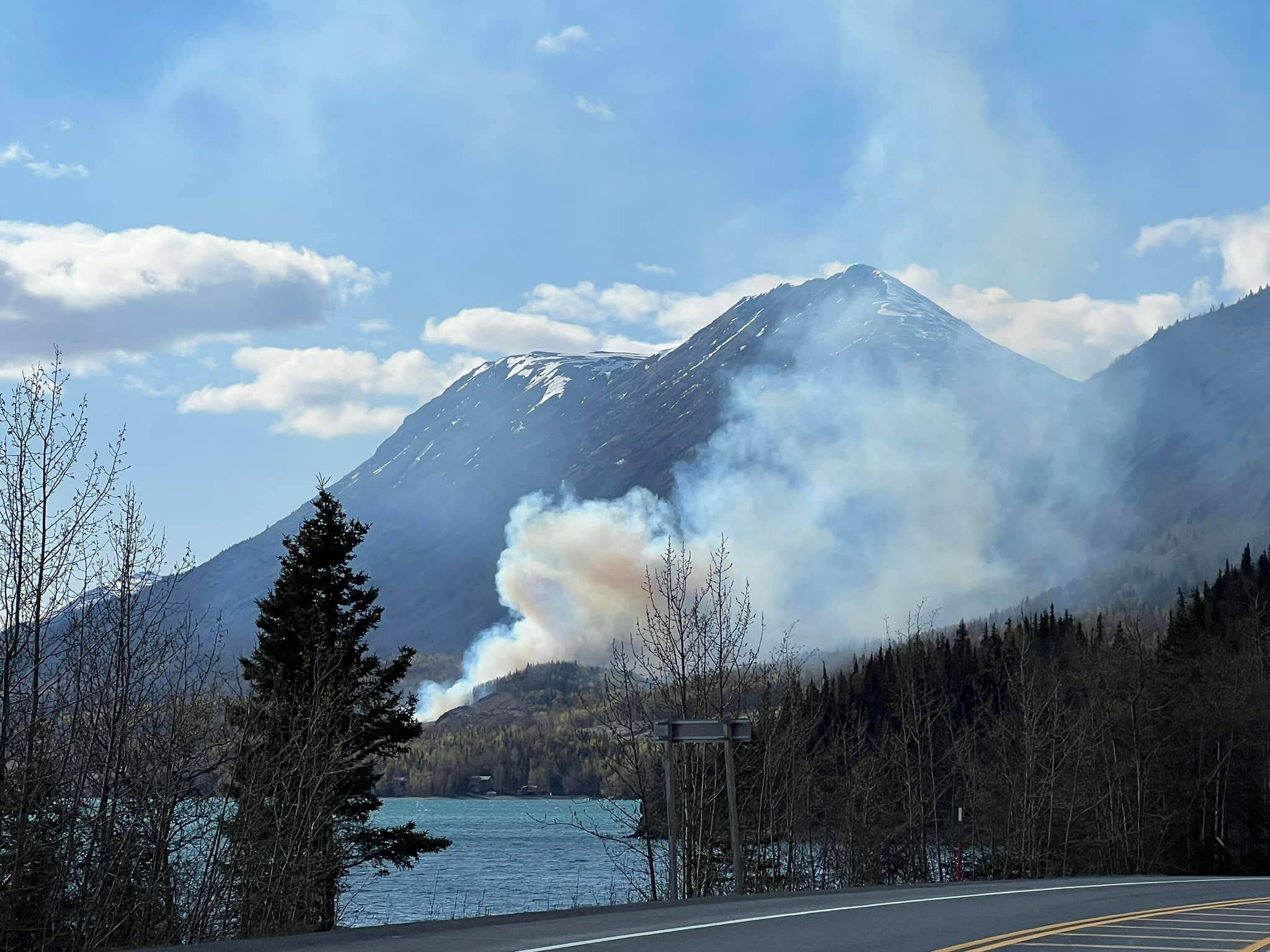 A wildfire burns near Milepost 46.5 of the Sterling Highway on Tuesday, May 10, 2022, near Cooper Landing, Alaska. (Photo courtesy Cooper Landing Emergency Services)