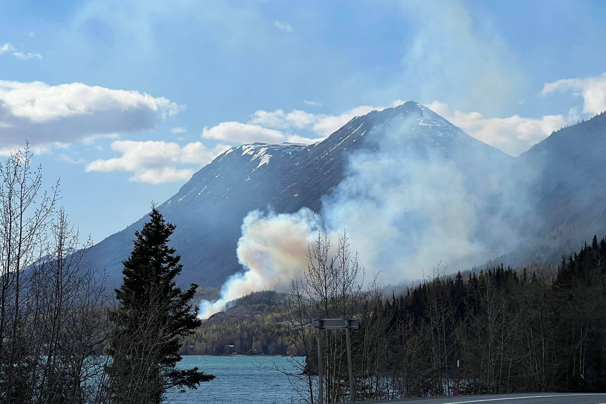 A wildfire burns near Milepost 46.5 of the Sterling Highway on Tuesday, May 10, 2022, near Cooper Landing, Alaska. (Photo courtesy Cooper Landing Emergency Services)