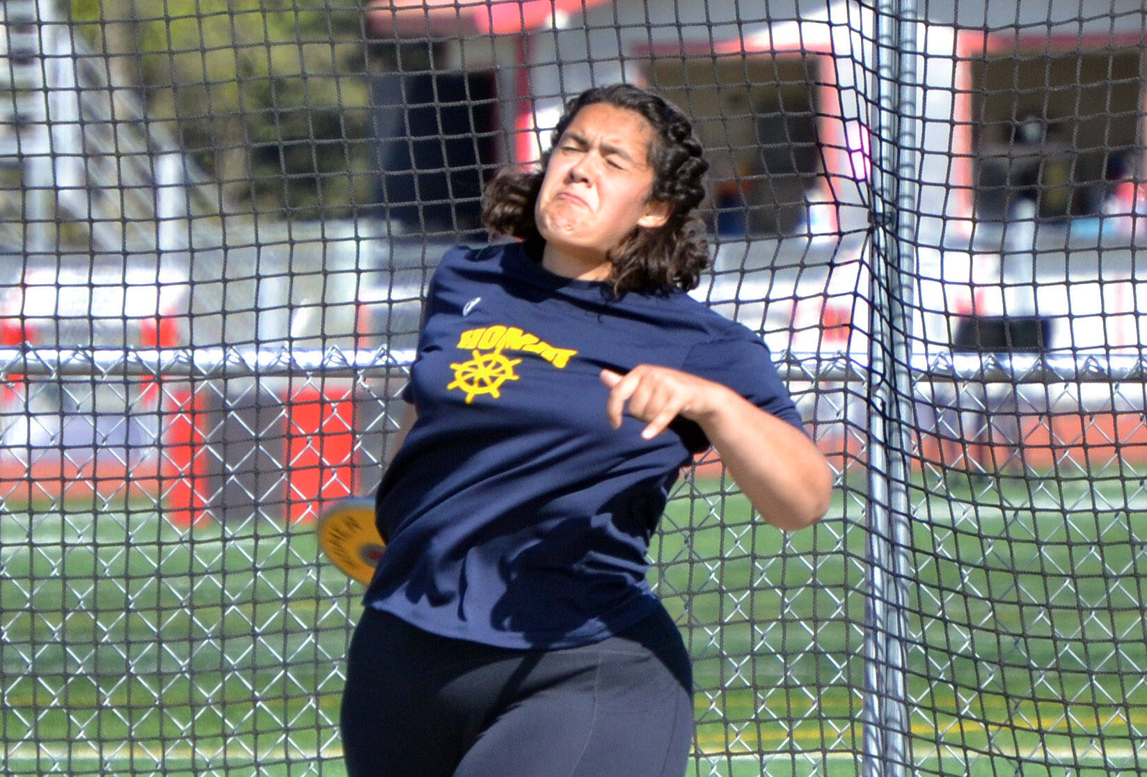 Homer’s Auden Cress throws the discus at the Region 3/Division II meet Friday, May 20, 2022, at Ed Hollier Field at Kenai Central High School in Kenai, Alaska. (Photo by Jeff Helminiak/Peninsula Clarion)