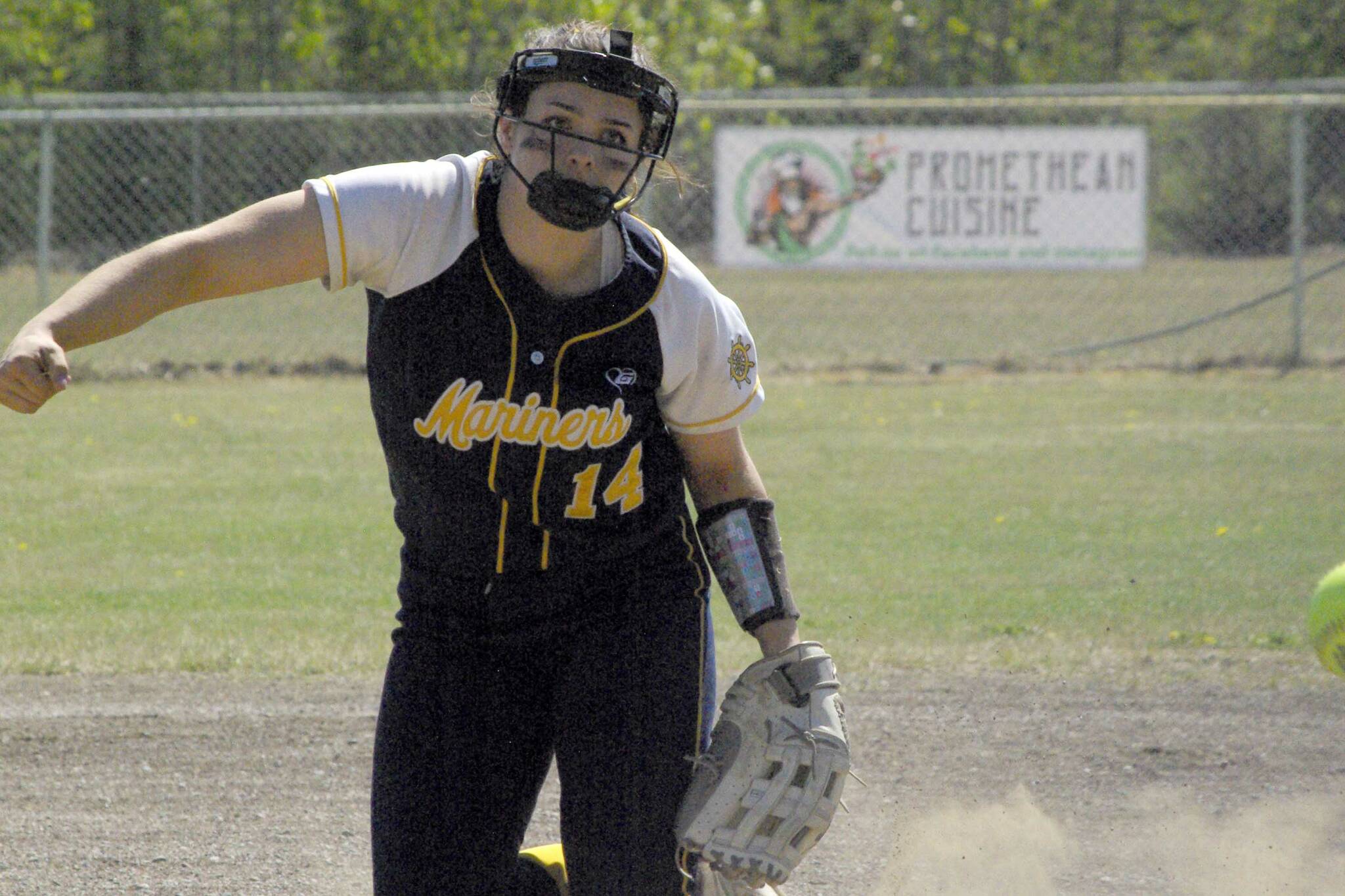 Homer's Zoe Adkins pitches to Palmer on Friday, May 27, 2022, at the Northern Lights Conference tournament at the Soldotna Little League fields in Soldotna, Alaska. (Photo by Jeff Helminiak/Peninsula Clarion)