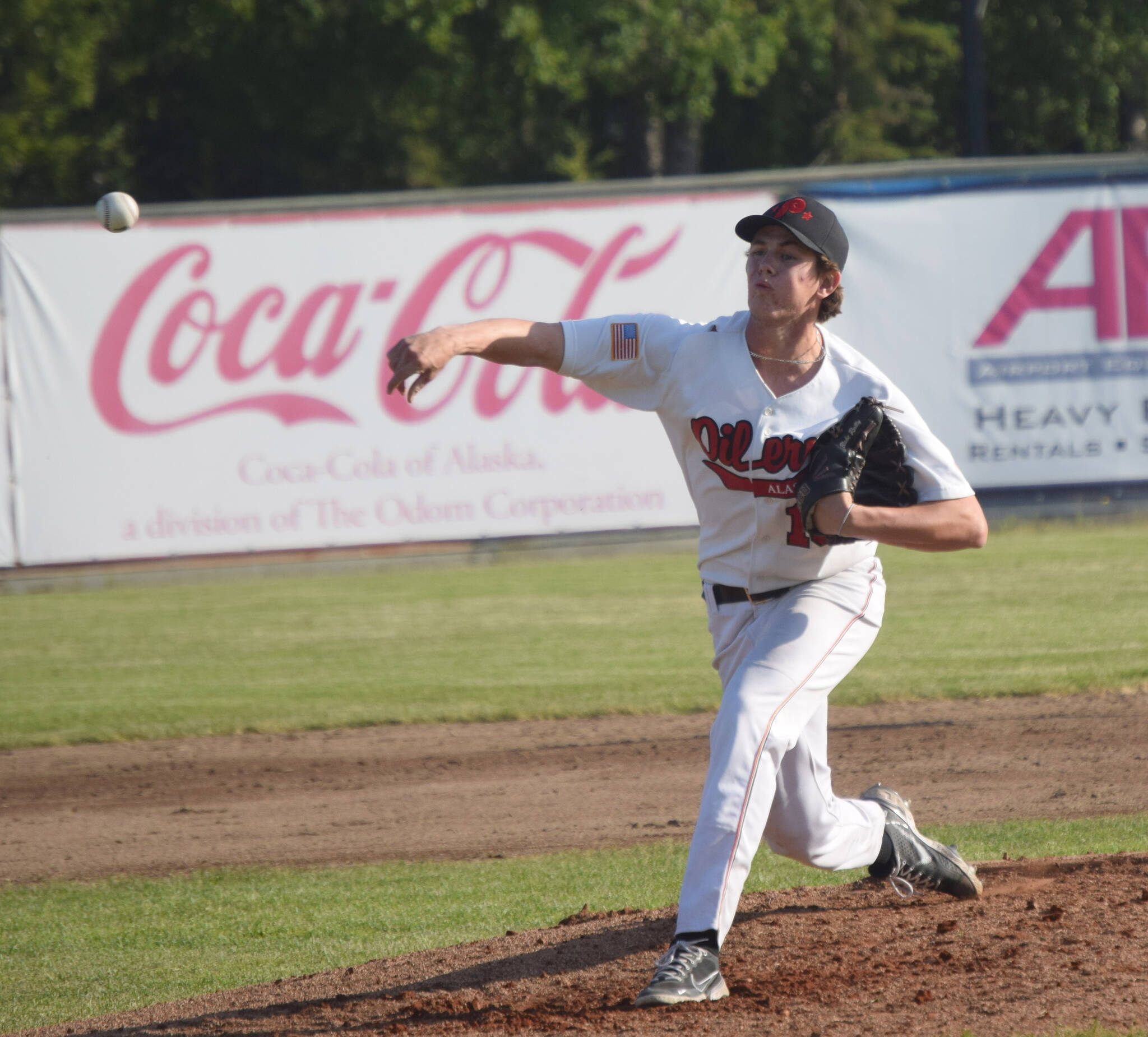 Oilers relief pitcher Blake Reilly delivers to the Anchorage Glacier Pilots on Thursday, June 23, 2022, at Coral Seymour Memorial Park in Kenai, Alaska. (Photo by Jeff Helminiak/Peninsula Clarion)