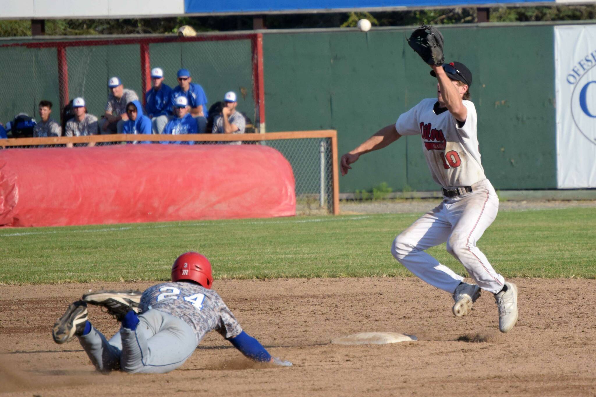 Oilers shortstop Trey Becker gets ready to tag out Grant Weiss of the Anchorage Glacier Pilots on Thursday, June 23, 2022, at Coral Seymour Memorial Park in Kenai, Alaska. (Photo by Jeff Helminiak/Peninsula Clarion)