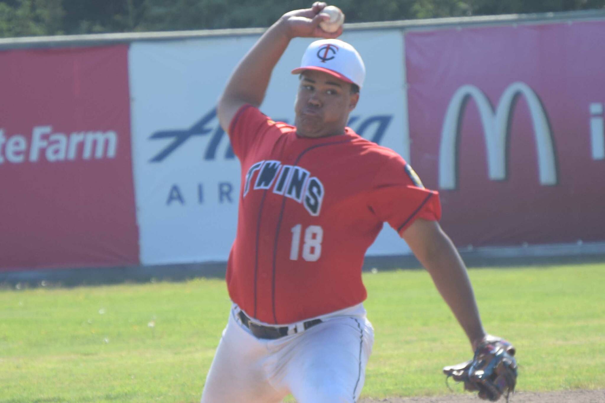 Post 20 Twins relief pitcher Atticus Gibson delivers to the Buffalo (Minnesota) Post 270 Cobras on Tuesday, June 28, 2022, during the Bill Miller/Lance Coz Wood Bat Invitational at Coral Seymour Memorial Park in Kenai, Alaska. (Photo by Jeff Helminiak/Peninsula Clarion)