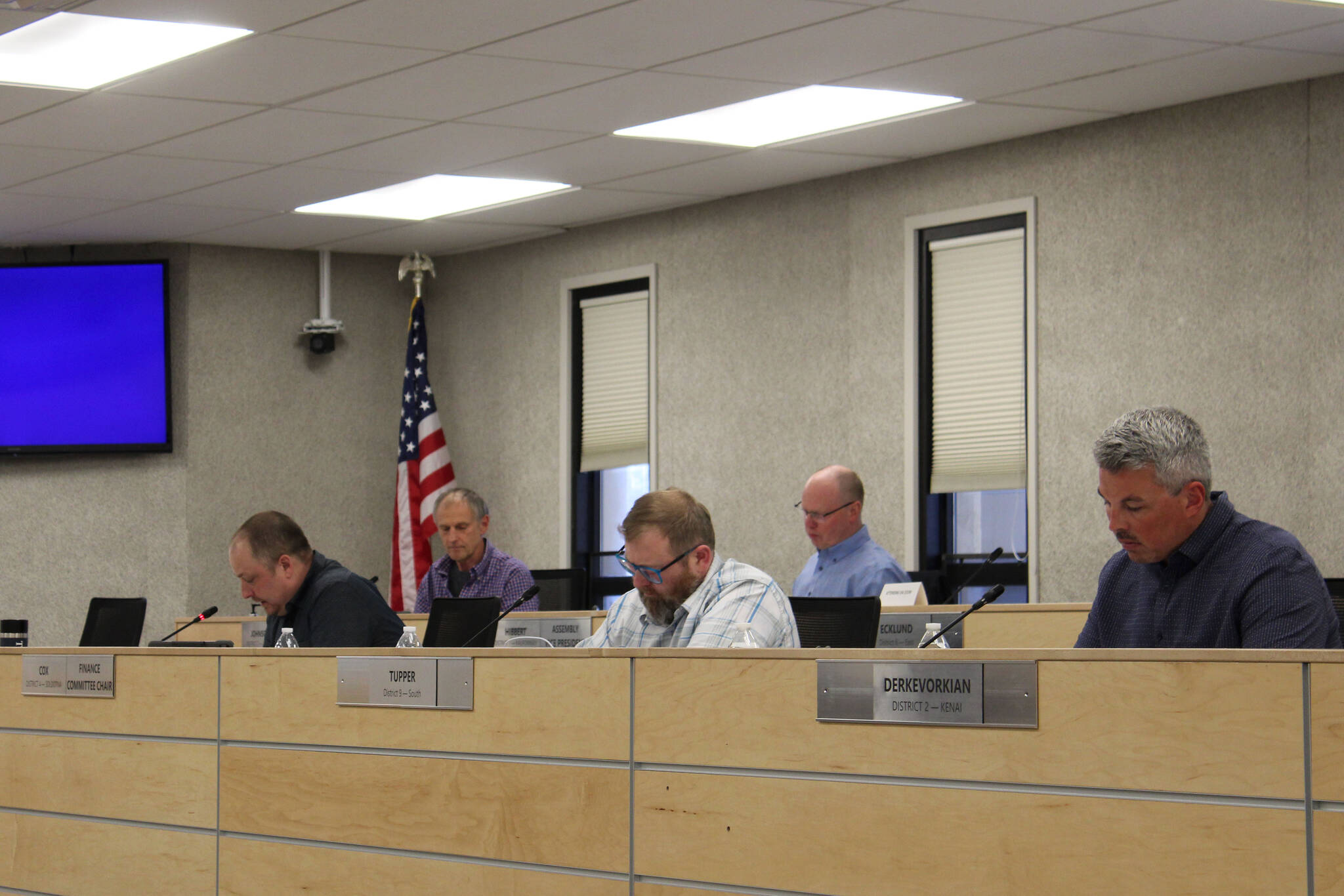 Tyson Cox, left, speaks during a meeting of the Kenai Penisula Borough Assembly on Tuesday, April 19, 2022, in Soldotna, Alaska. (Ashlyn O’Hara/Peninsula Clarion)