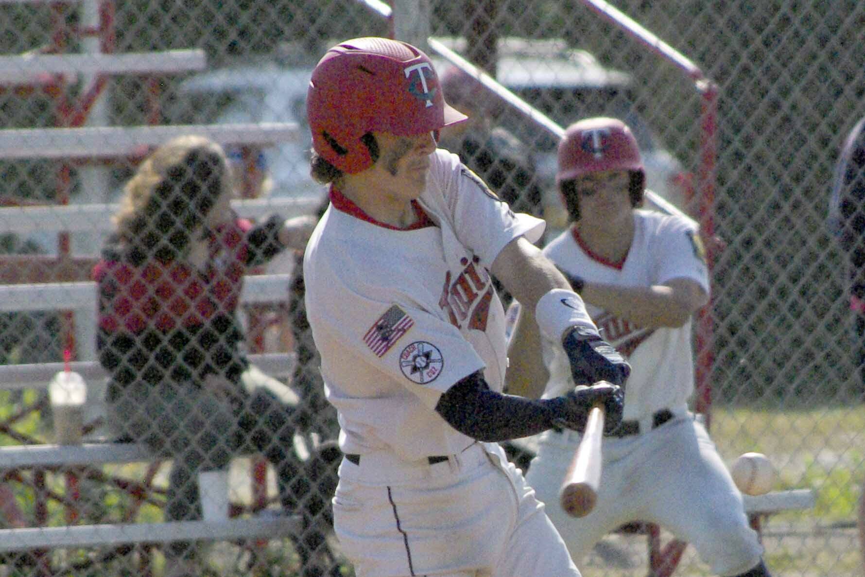 Post 20 Twins catcher Jacob Belger flies out against the Napoleon (Ohio) Post 300 River Bandits at the Bill Miller/Lance Coz Wood Bat Tournament on Thursday, June 30, 2022, at Coral Seymour Memorial Park in Kenai, Alaska. (Photo by Jeff Helminiak/Peninsula Clarion)