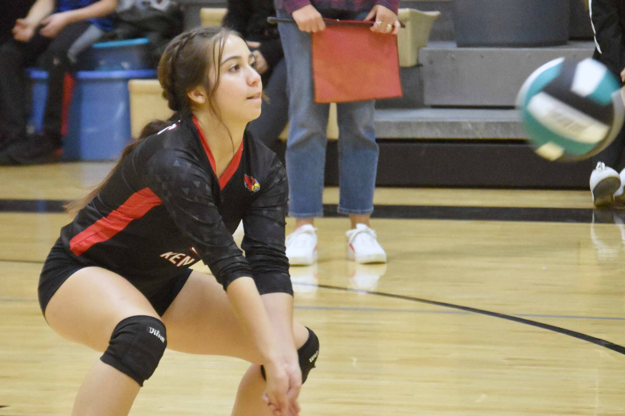 Kenai Central's Jaycie Castillo digs up a ball Saturday, Aug. 27, 2022, at the Shayna Pritchard Memorial Volleyball Tournament at Nikiski High School in Nikiski, Alaska. (Photo by Jeff Helminiak/Peninsula Clarion)