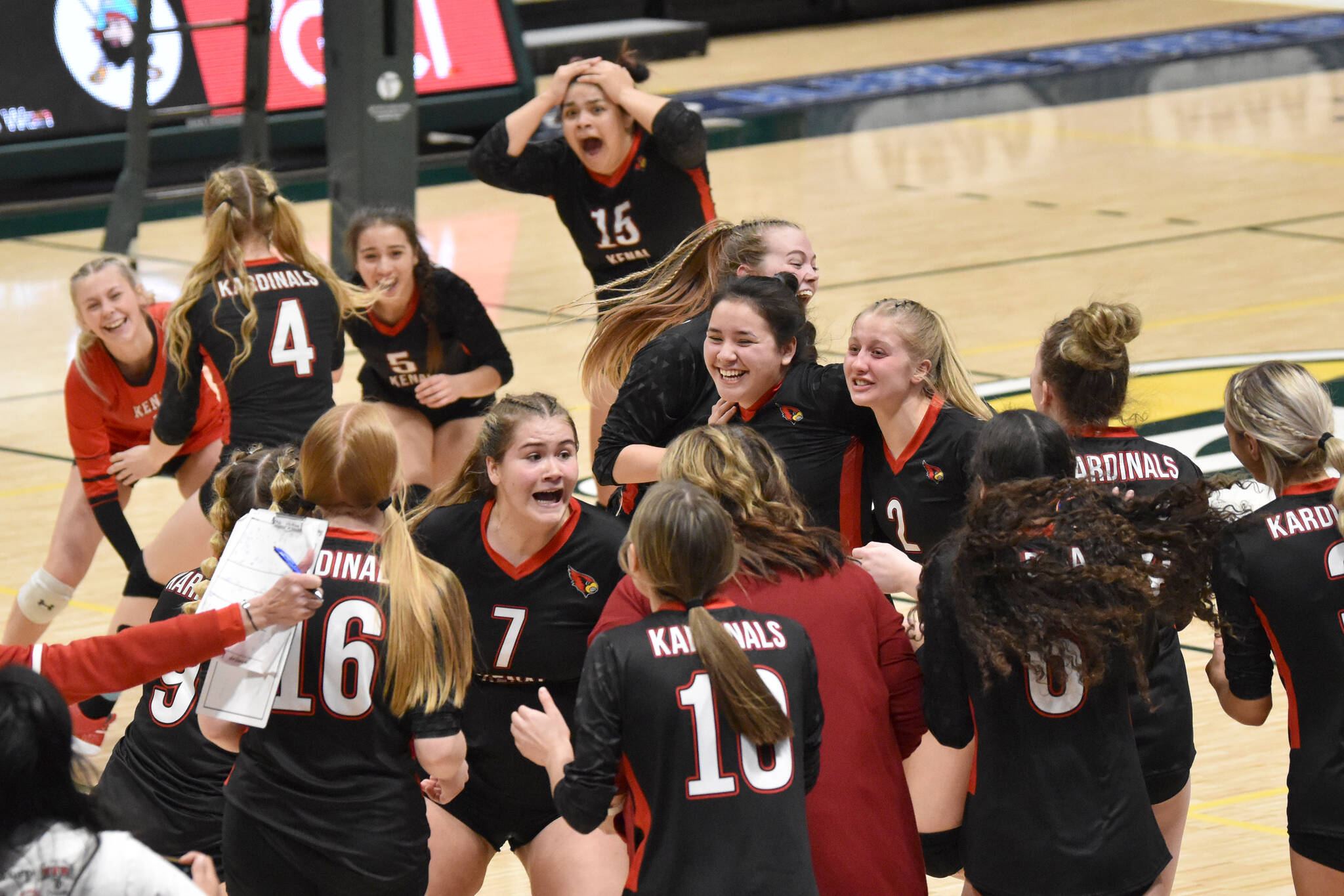 Kenai celebrates winning the Class 3A state title Saturday, Nov. 12, 2022, at the Alaska Airlines Center in Anchorage, Alaska. (Photo by Jeff Helminiak/Peninsula Clarion)