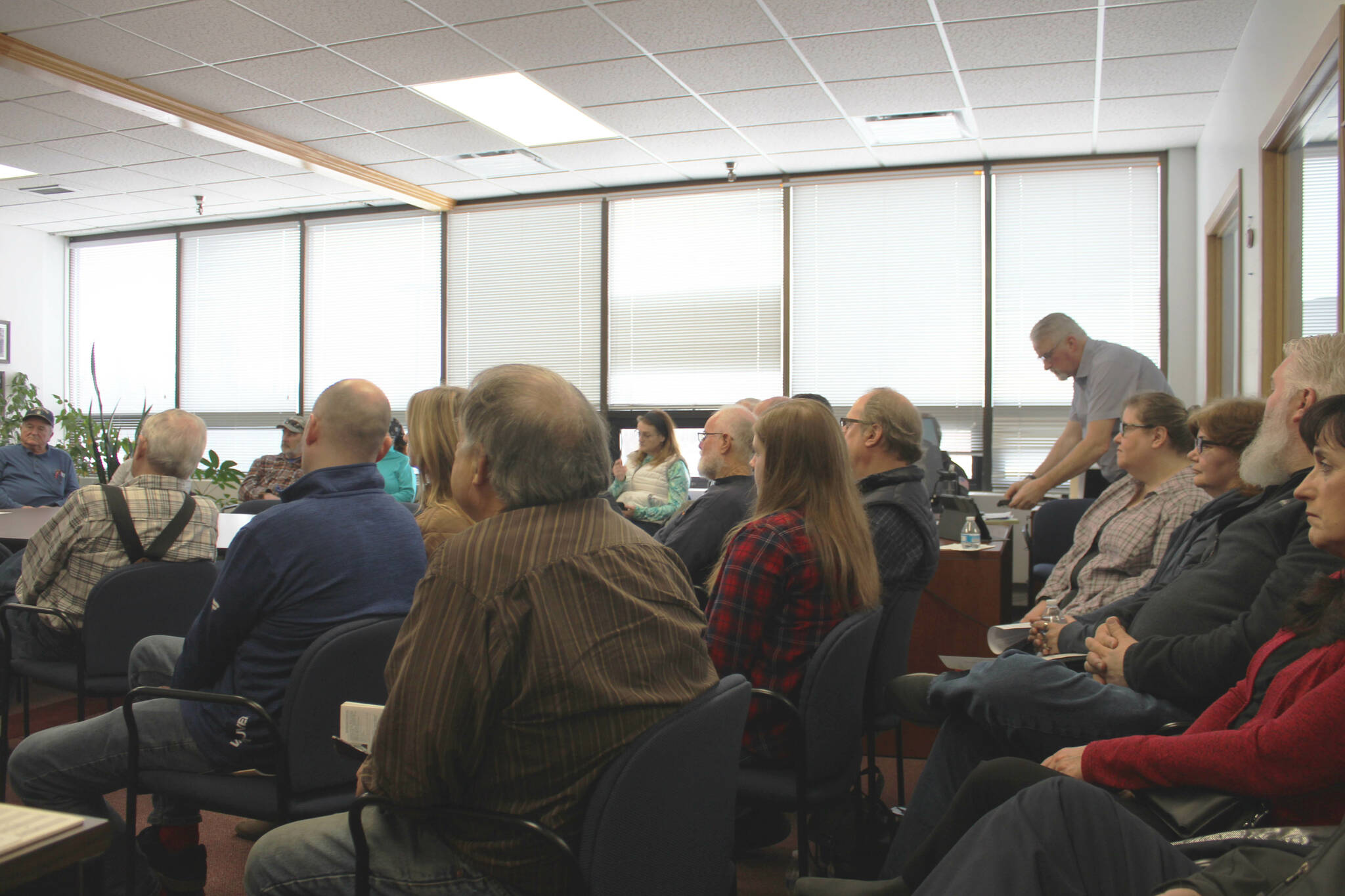 Attendees listen to Rep. Justin Ruffridge and Sen. Jesse Bjorkman during a town hall event on Saturday, April 15, 2023, in Kenai, Alaska. (Ashlyn O’Hara/Peninsula Clarion)