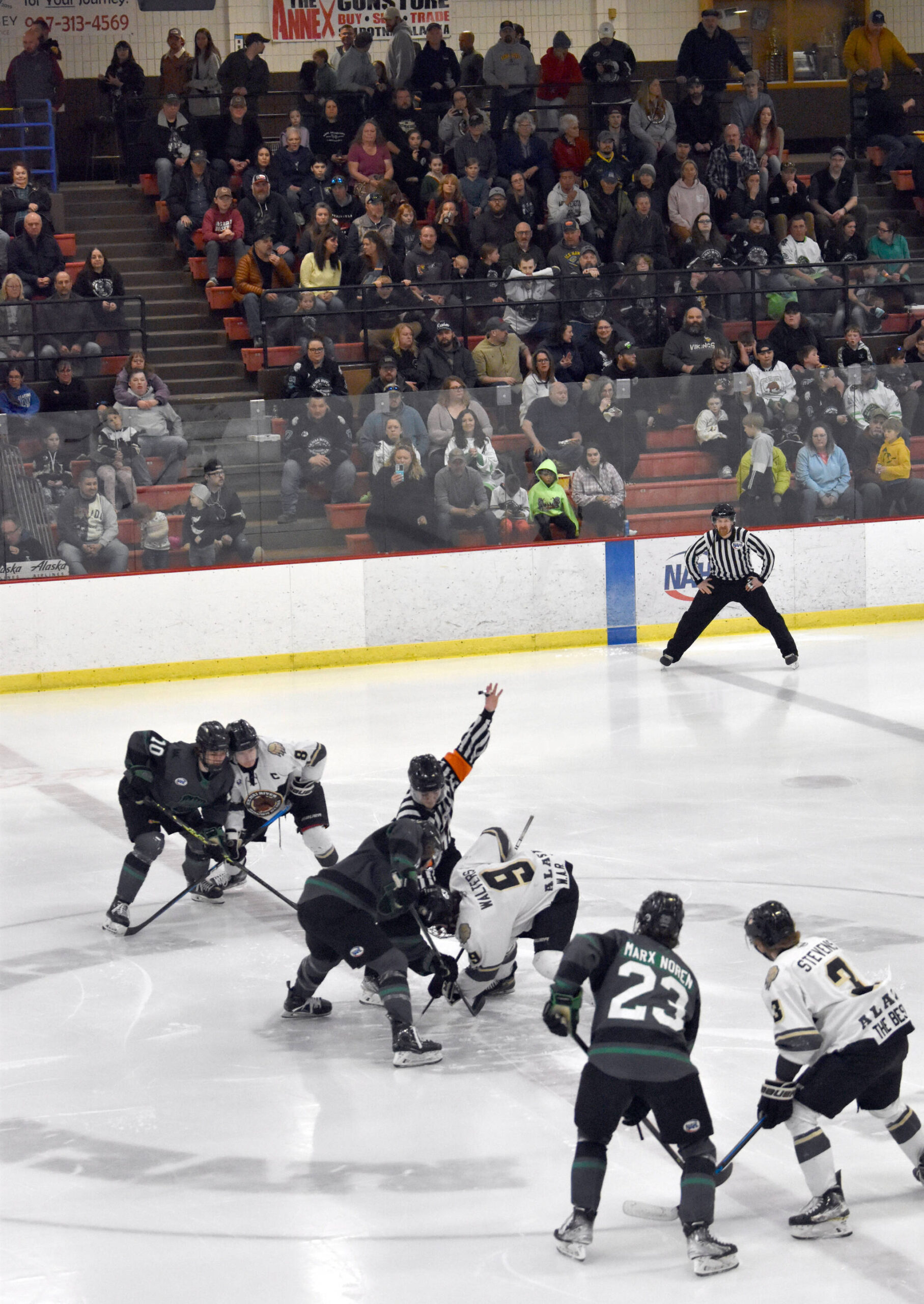 The puck drops on Game 3 of the Midwest Division semifinals Friday, April 28, 2023, at the Soldotna Regional Sports Complex in Soldotna, Alaska. (Photo by Jeff Helminiak/Peninsula Clarion)