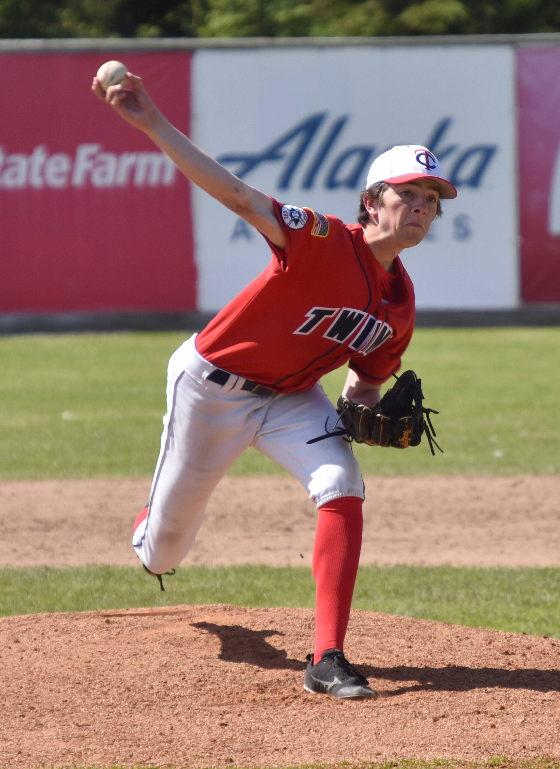 Legion Twins reliever Derrick Jones delivers to Chugiak on Sunday, July 9, 2023, at Coral Seymour Memorial Park in Kenai, Alaska. (Photo by Jeff Helminiak/Peninsula Clarion)