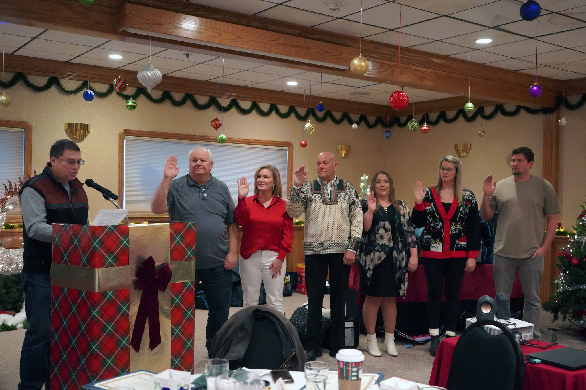 The new board of directors for the Kenai Peninsula Association of Realtors is sworn in at Kenai Catering on Thursday, Dec. 14, 2023. (Jake Dye/Peninsula Clarion)