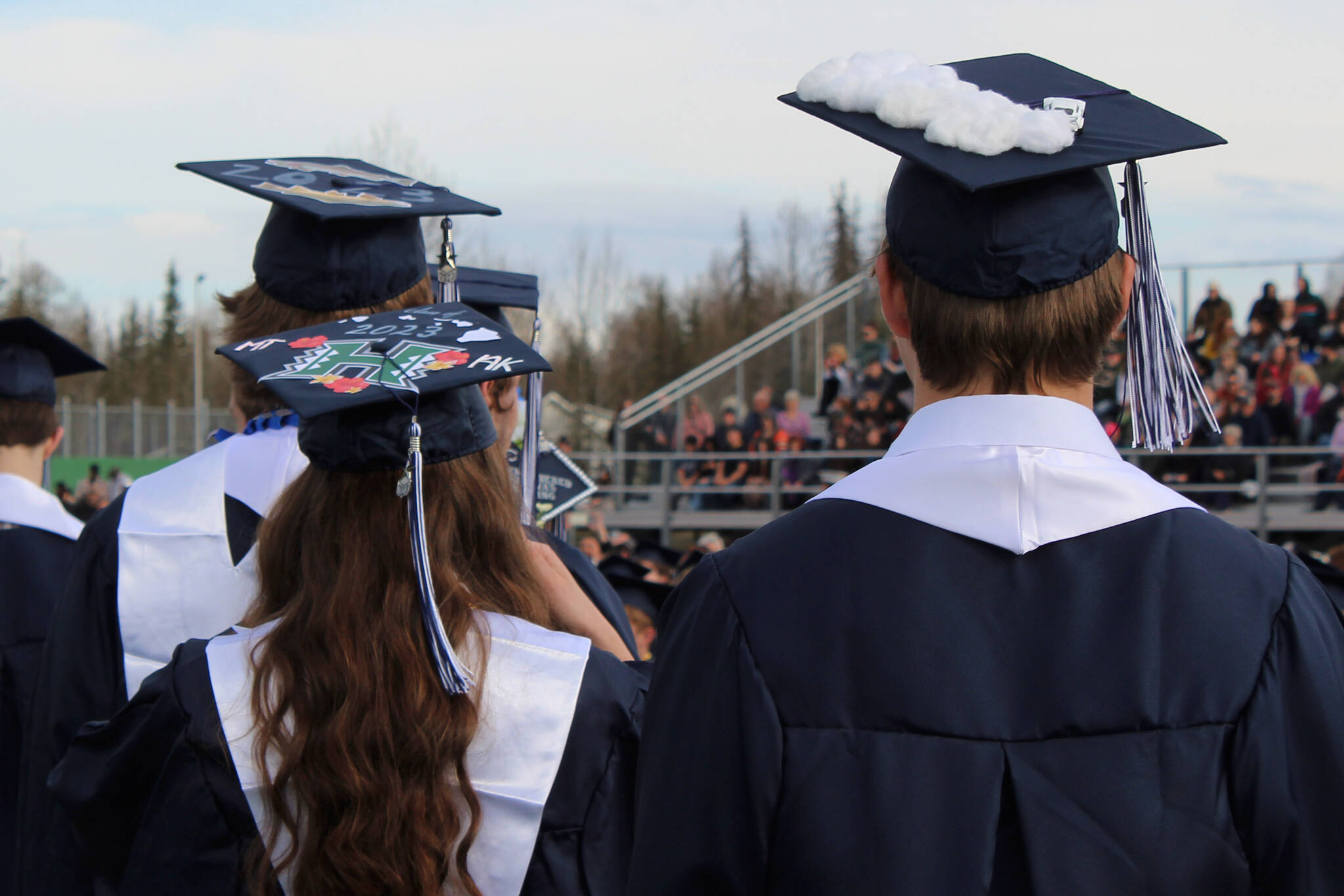 Graduates wear decorated caps during Soldotna High School’s commencement ceremony on Monday, May 15, 2023, in Soldotna, Alaska. (Ashlyn O’Hara/Peninsula Clarion)