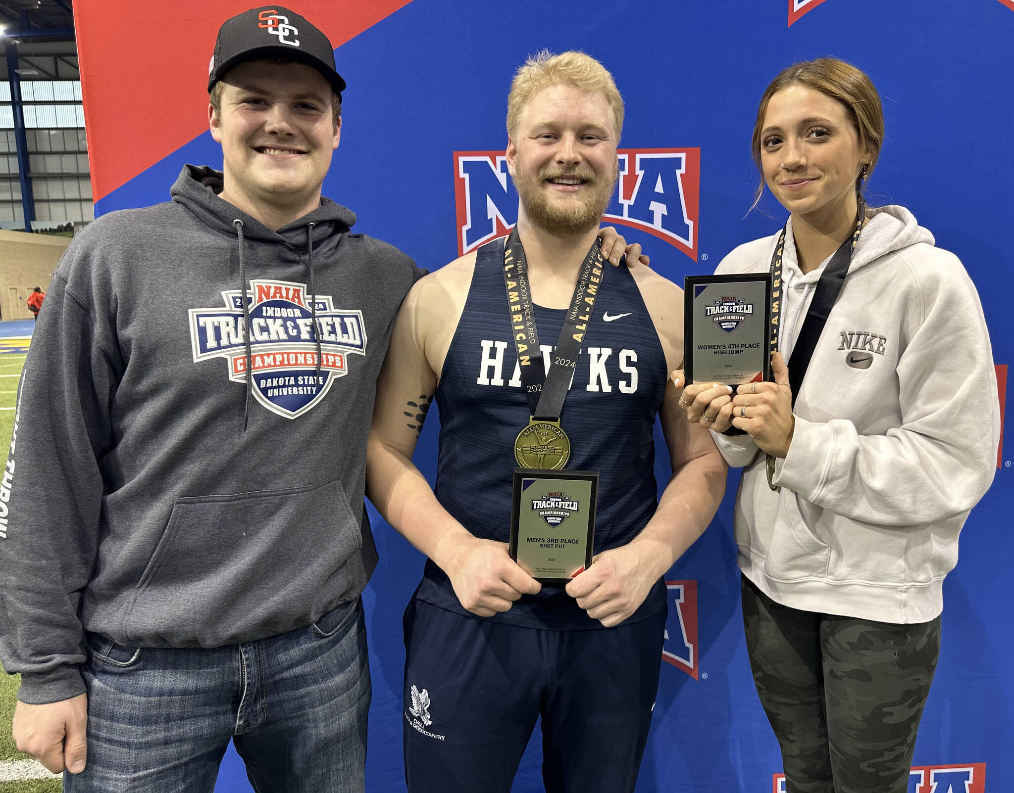 Dylan Dahlgren, Galen Brantley III and Adarra Hagelund at the NAIA Indoor Track and Field National Championships in Brookings, South Dakota. (Photo provided)