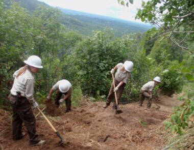 A YCC crew constructs a reroute on Skyline trail. (Photo by USFWS)