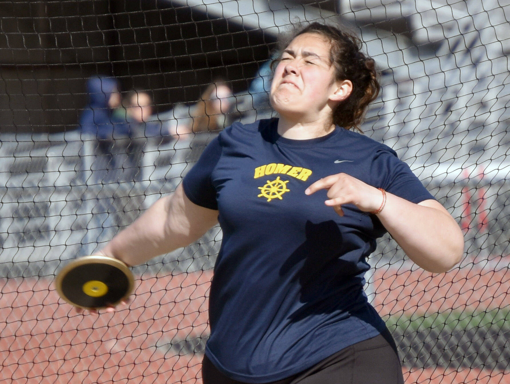 Homer’s Auden Cress finishes second in the discus Saturday, April 27, 2024, at the Kenai Invitational at Kenai Central High School in Kenai, Alaska. (Photo by Jeff Helminiak/Peninsula Clarion)