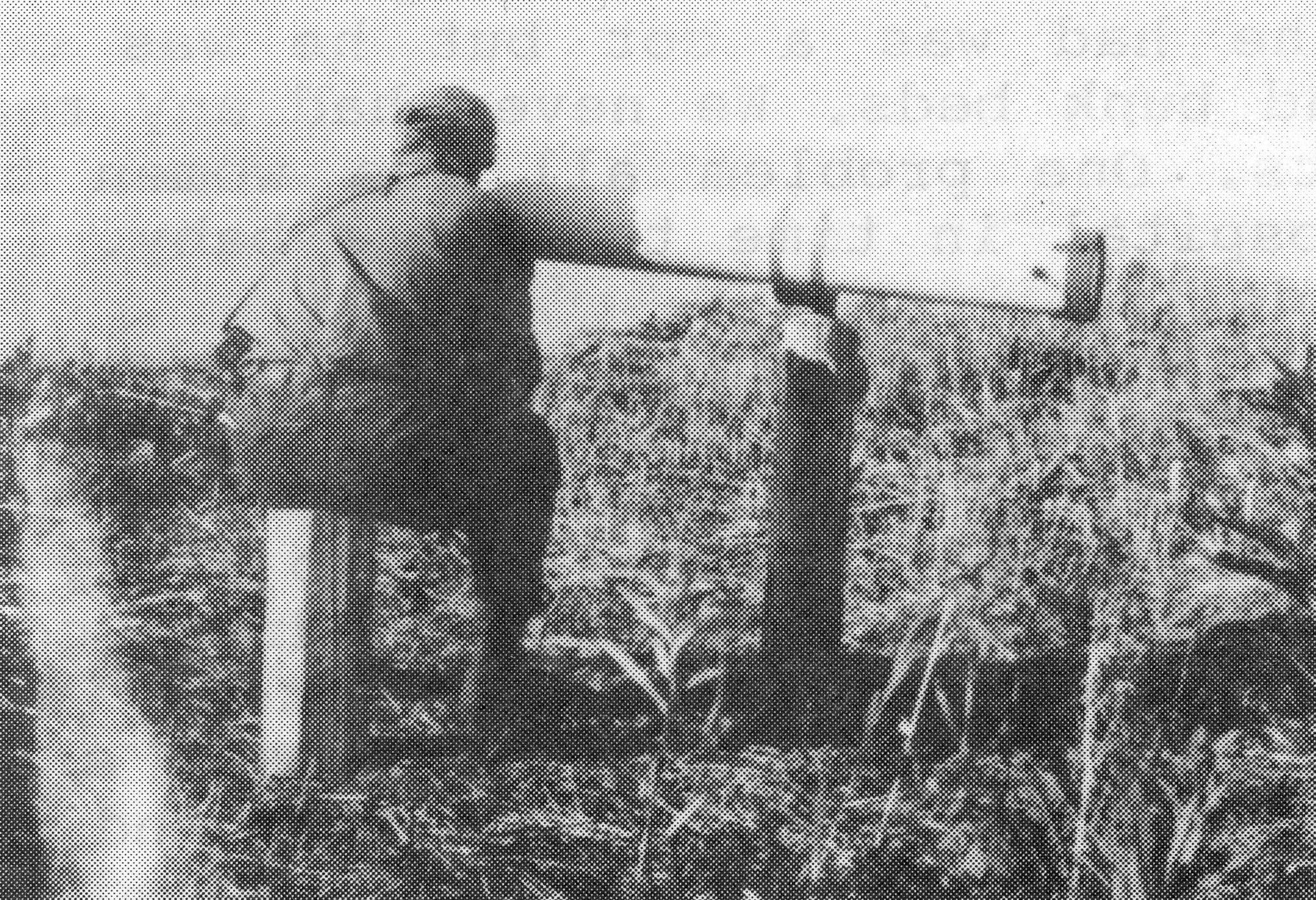 Photo from “The Pioneers of Happy Valley, 1944-1964,” by Ella Mae McGann
Happy Valley homesteader Wayne Jones looks through the telescope built by Rex Hanks, circa 1950.