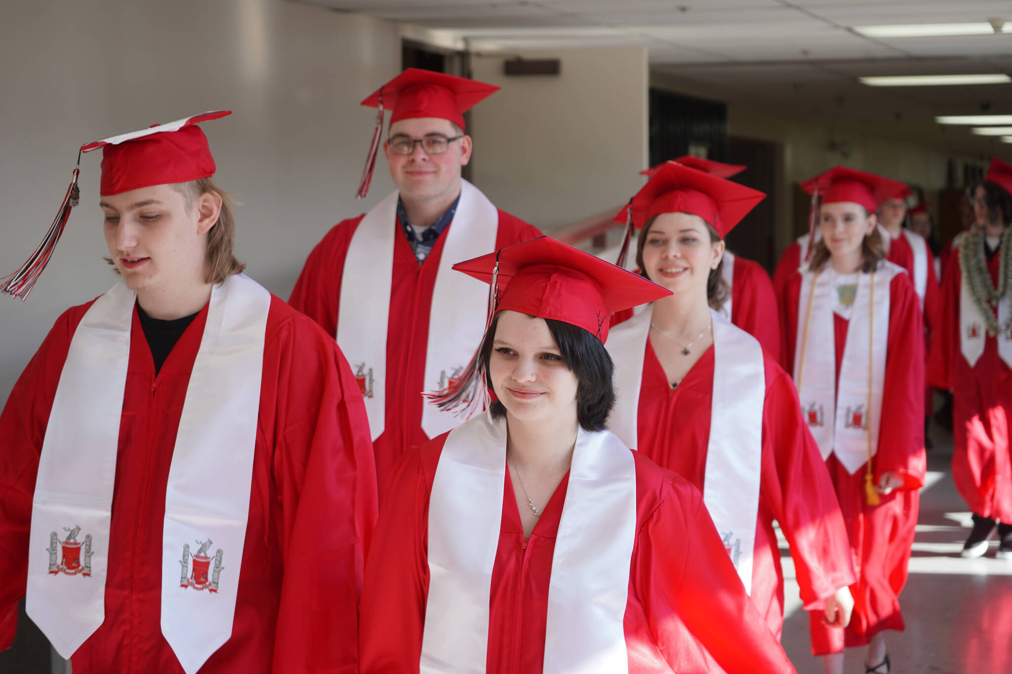 Graduates of Kenai Central High School proceed into the school’s auditorium in Kenai, Alaska, on Monday, May 13, 2024. (Jake Dye/Peninsula Clarion)