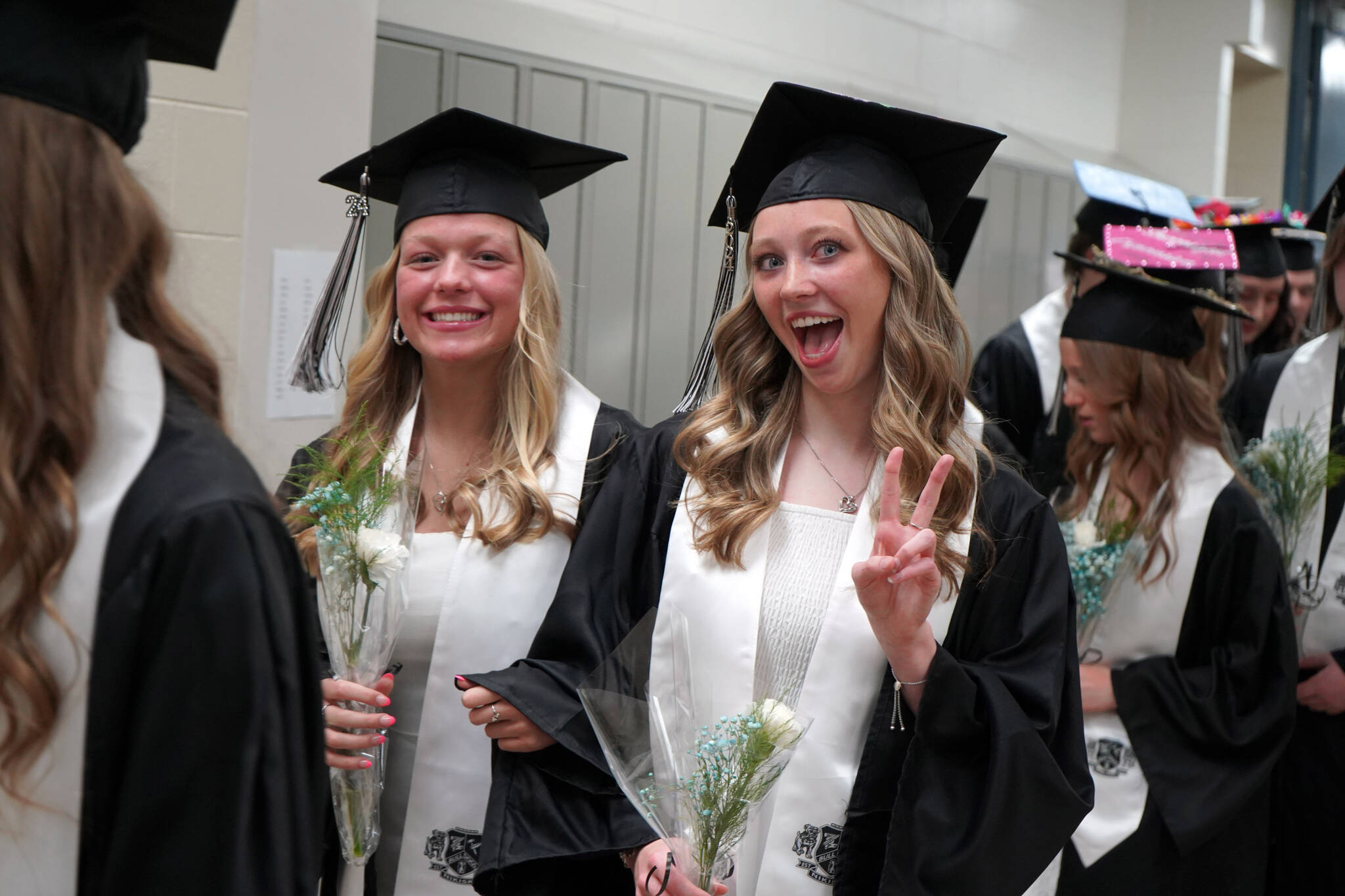 Nikiski Middle/High School graduates proceed into a graduation ceremony in the school’s gym in Nikiski, Alaska, on Wednesday, May 15, 2024. (Jake Dye/Peninsula Clarion)