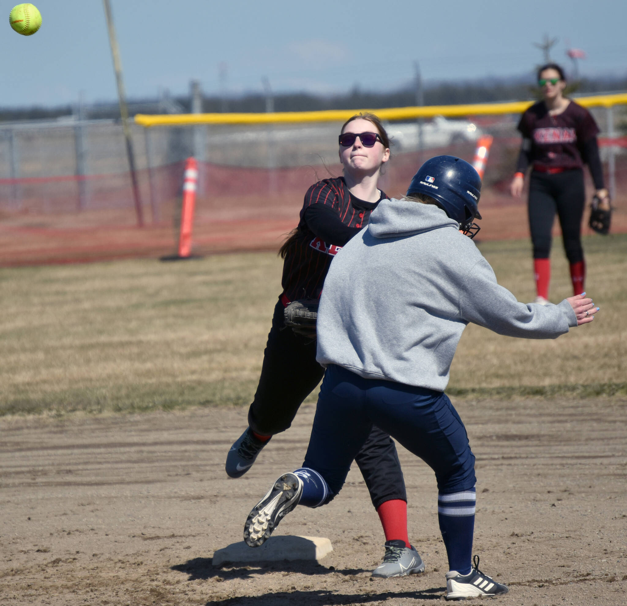 Kenai Central’s Avery Ellis forces out Soldotna’s Kadee Adams out at second base Wednesday, May 15, 2024, at the Steve Shearer Memorial Ball Park in Kenai, Alaska. (Photo by Jeff Helminiak/Peninsula Clarion)