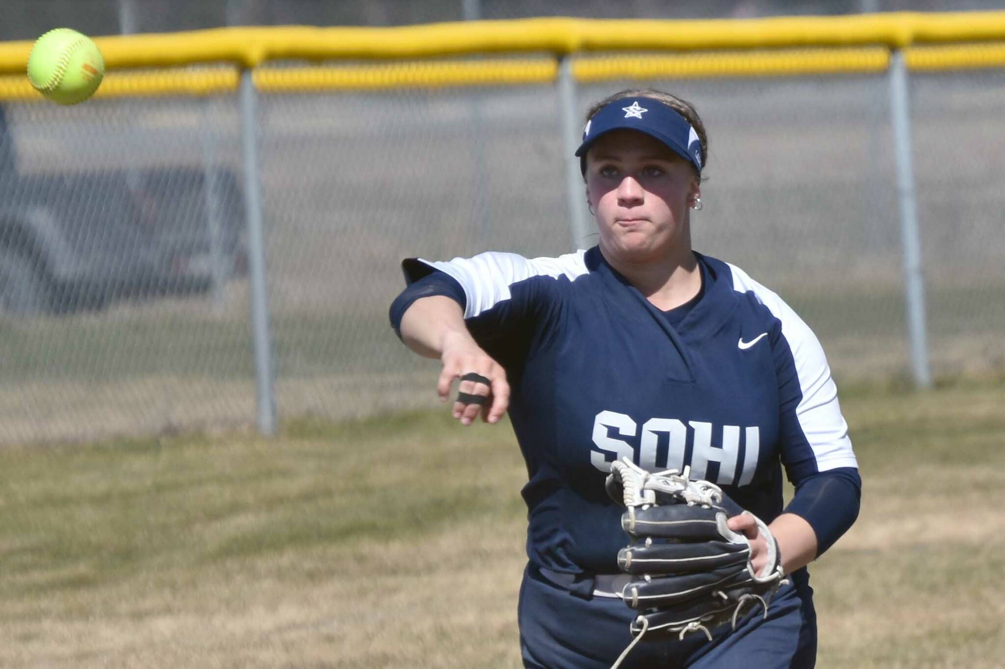 Soldotna's Alyssa McDonald throws out a runner against Kenai Central on Wednesday, May 15, 2024, at the Steve Shearer Memorial Ball Park in Kenai, Alaska. (Photo by Jeff Helminiak/Peninsula Clarion)