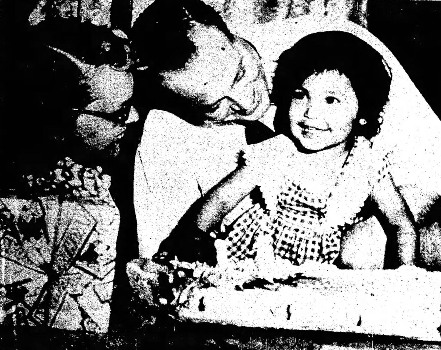 Ruth Ann and Oscar Pederson share smiles with young Vicky, a foster daughter they were trying to adopt in 1954. This front-page photograph appeared in the Fairbanks Daily News-Miner on June 17, 1954.