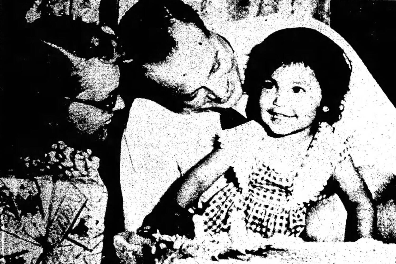 Ruth Ann and Oscar Pederson share smiles with young Vicky, a foster daughter they were trying to adopt in 1954. This front-page photograph appeared in the Fairbanks Daily News-Miner on June 17, 1954.