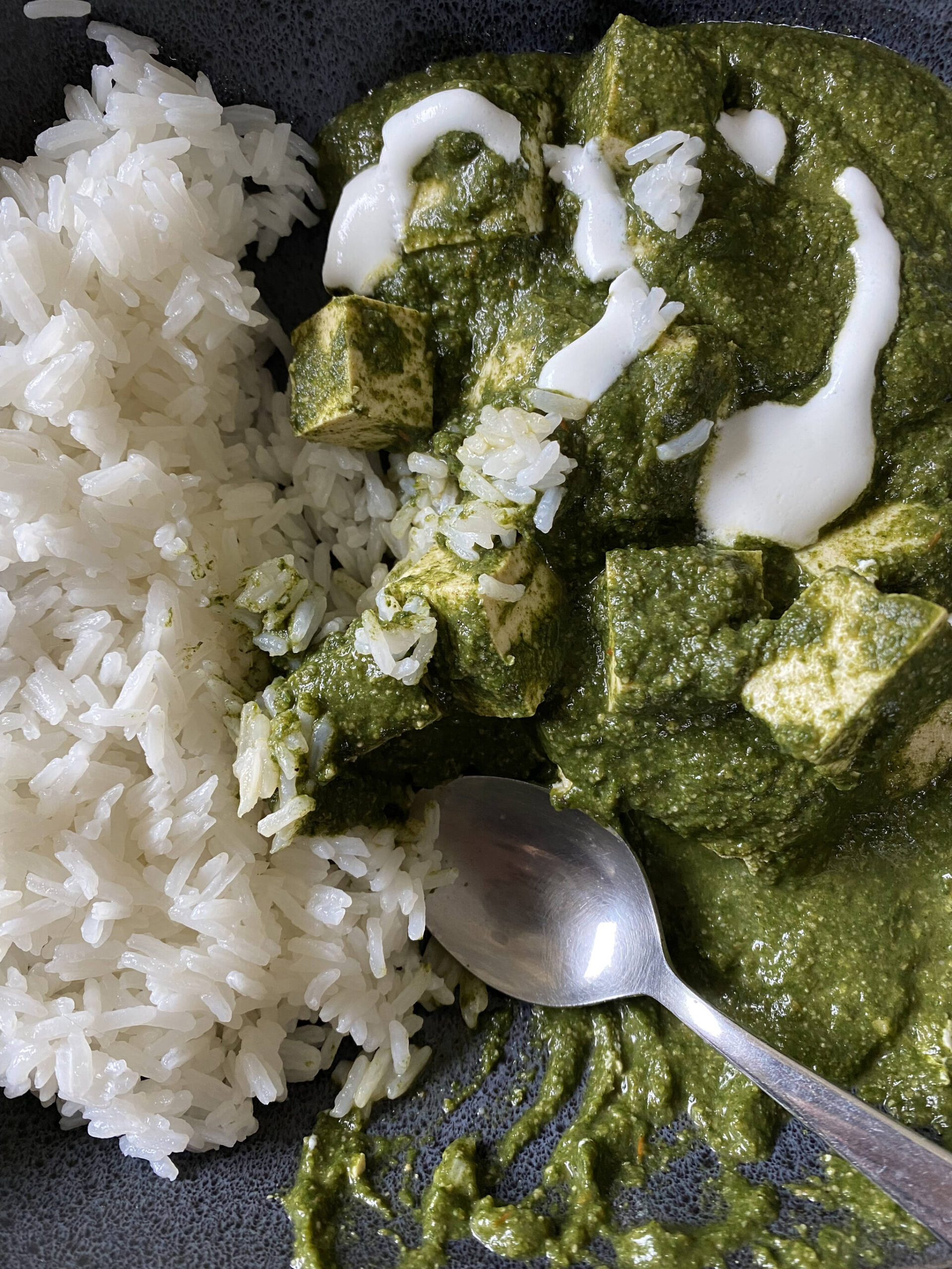 Palak tofu, served here with rice, is a vegan version of palak paneer. (Photo by Tressa Dale/Peninsula Clarion)