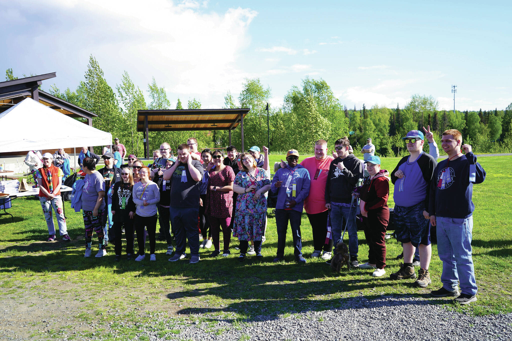 Jake Dye/Peninsula Clarion
Central Kenai Peninsula athletes who will be competing in the Special Olympics Alaska 2024 Summer State Games stand for a photo at Soldotna Creek Park on Tuesday.