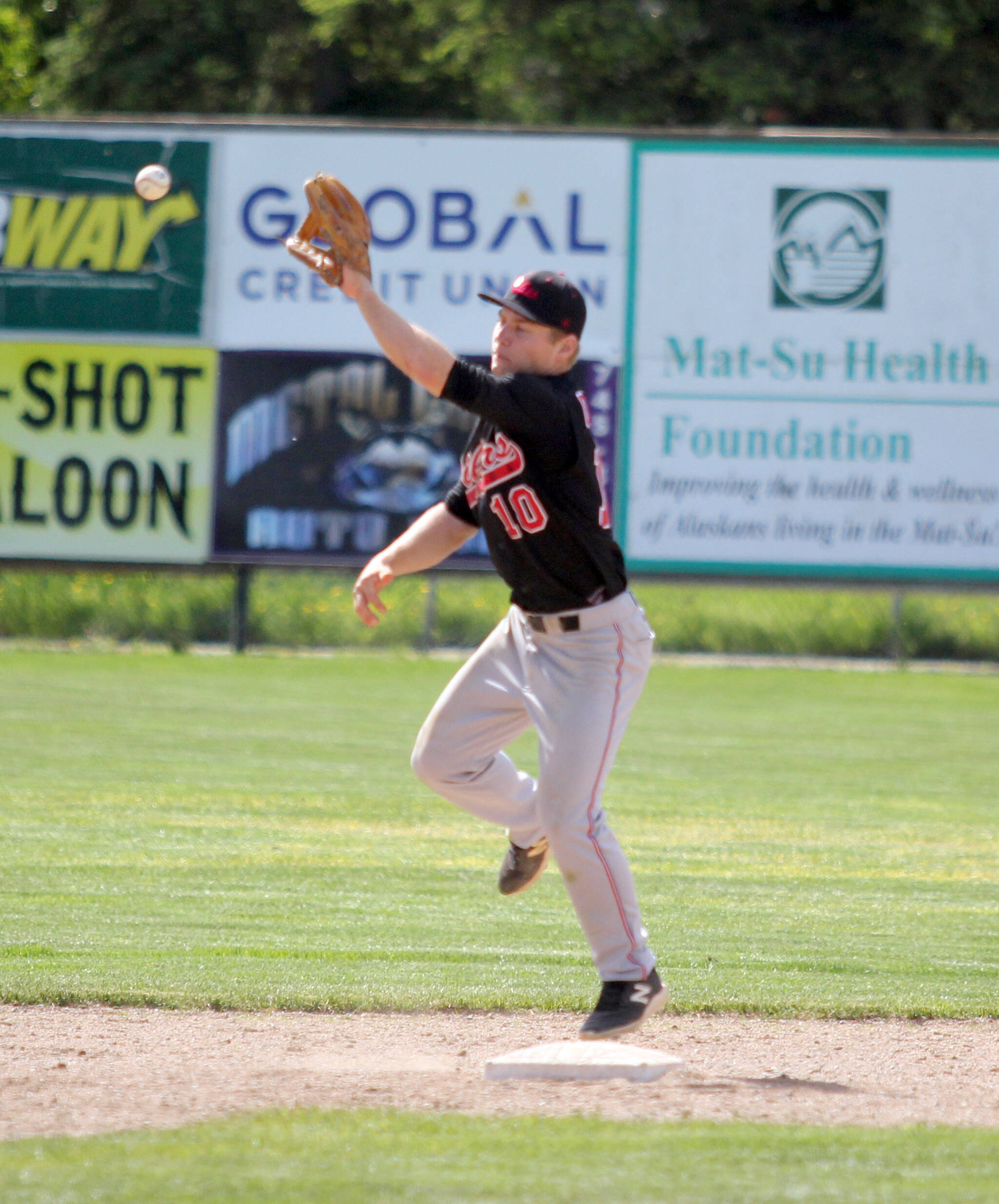 Oilers infielder Cole Dawson catches a throw from the outfield before trying to make the tag at second during a loss to the Mat-Su Miners on Sunday, June 9, 2024, at Hermon Brothers Field in Palmer, Alaska. (Photo by Jeremiah Bartz/Frontiersman)