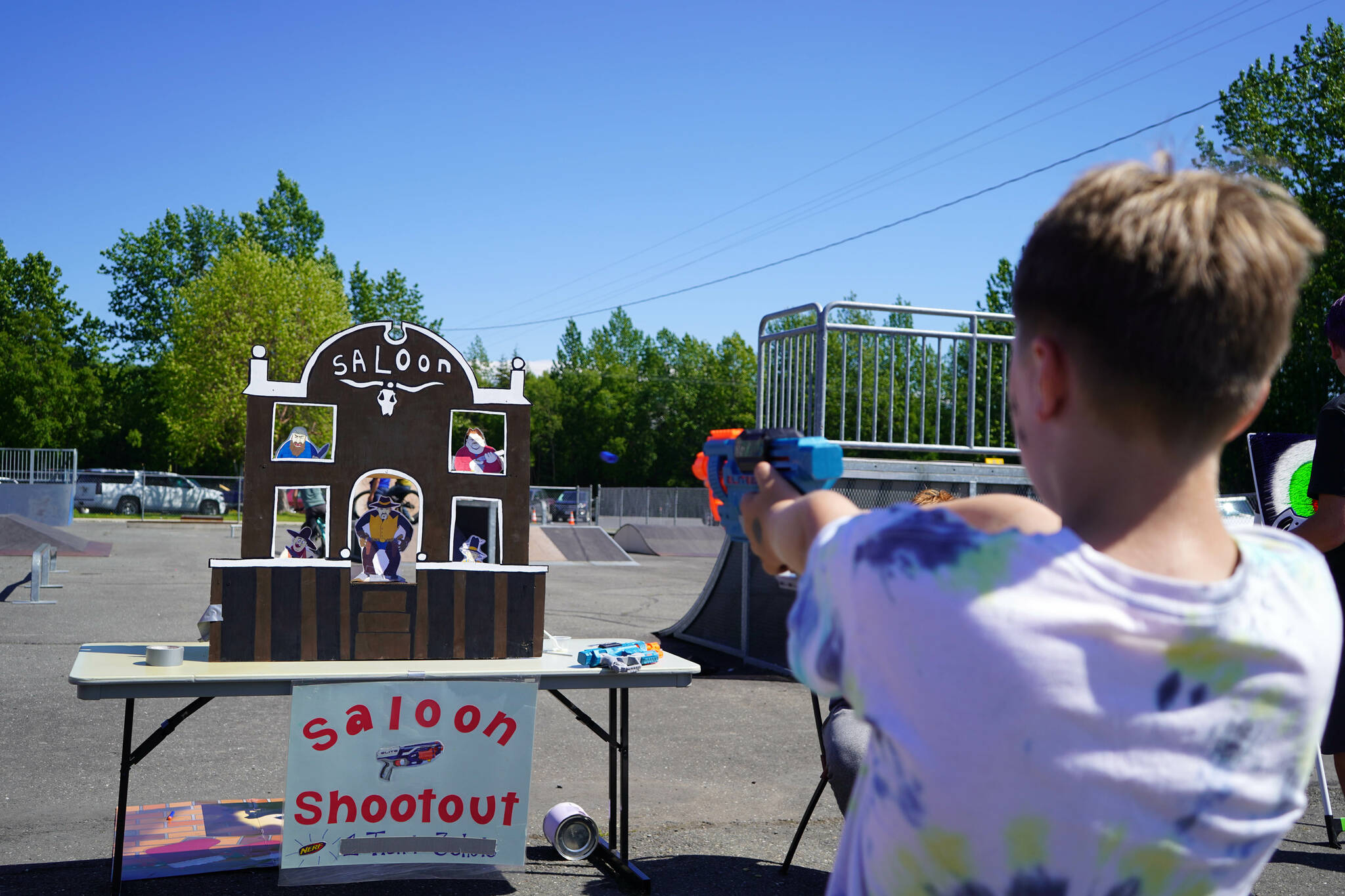 Attendees participate in carnival games during North Peninsula Recreation Service Area’s Family Fun in the Midnight Sun at the Nikiski Community Recreation Center in Nikiski, Alaska, on Saturday, June 15, 2024. (Jake Dye/Peninsula Clarion)