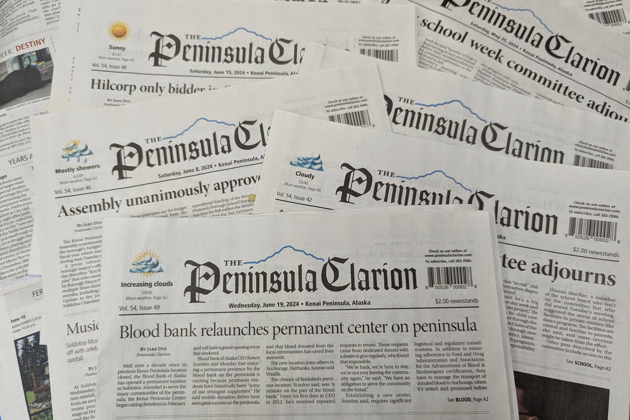 Copies of the Peninsula Clarion are photographed on Friday, June 21, 2024. (Photo by Erin Thompson/Peninsula Clarion)