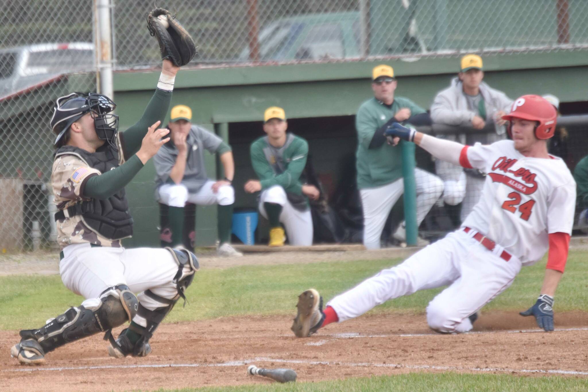 Mat-Su Miners catcher Blake Balsz forces out Cole Wilson of the Peninsula Oilers on Thursday, June 20, 2024, at Coral Seymour Memorial Park in Kenai, Alaska. (Photo by Jeff Helminiak/Peninsula Clarion)