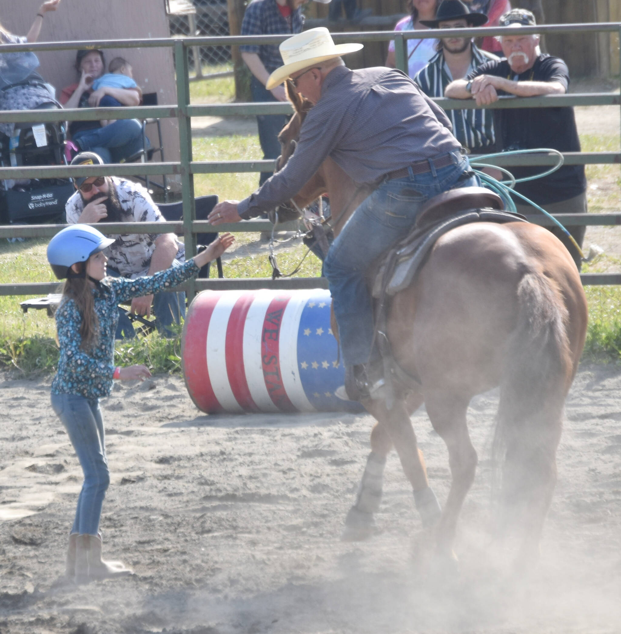 Gabby Bower and Dave Bower compete in Rescue Race on Saturday, June 22, 2024, at the second Soldotna Equestrian Association rodeo of the season at the Soldotna Rodeo Grounds in Soldotna, Alaska. (Photo by Jeff Helminiak/Peninsula Clarion)