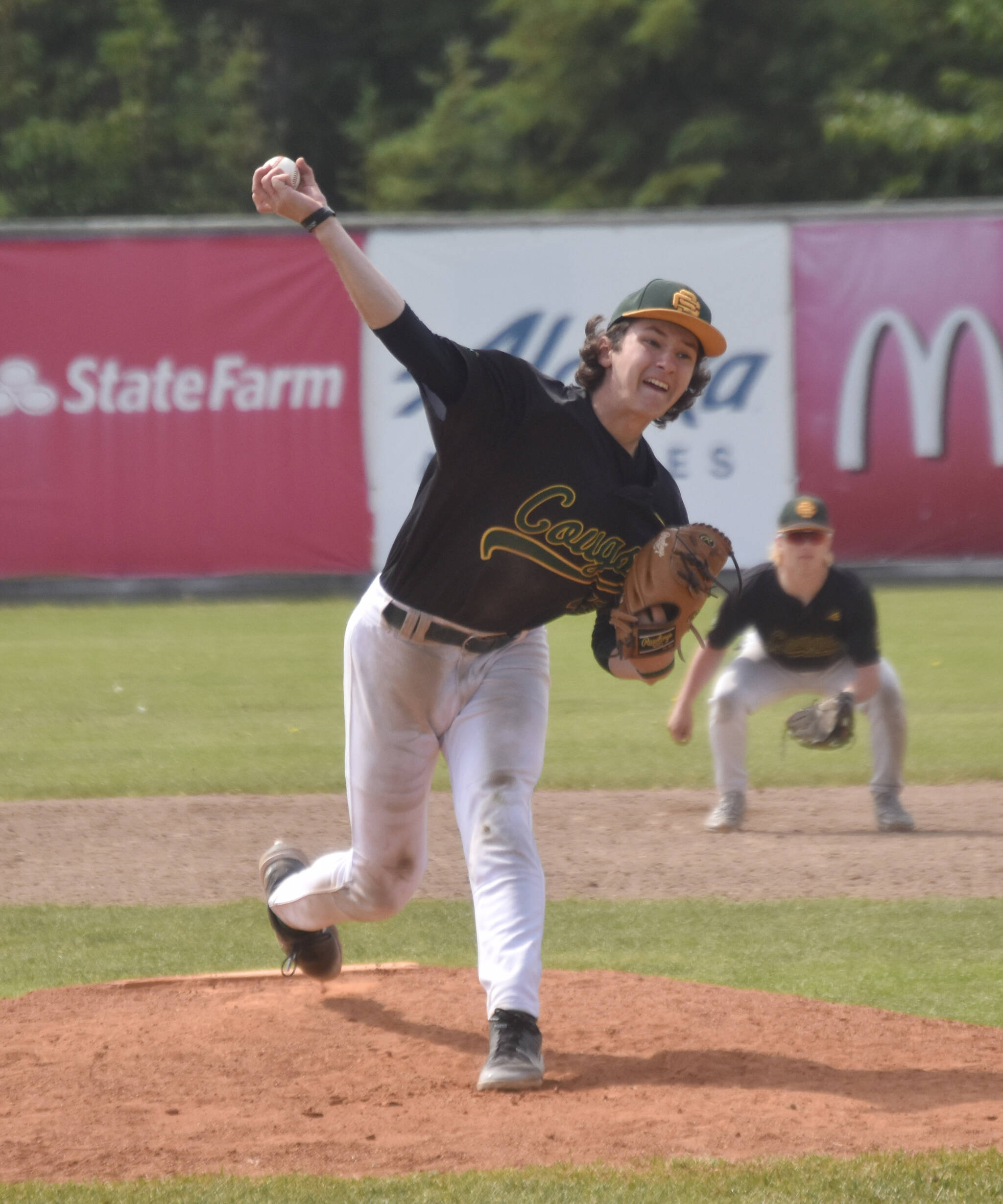 Service starting pitcher Hunter Christian delivers to Napoleon (Ohio) in the final of the Lance Coz Wood Bat Tournament on Monday, June 24, 2024, at Coral Seymour Memorial Park in Kenai, Alaska. (Photo by Jeff Helminiak/Peninsula Clarion)