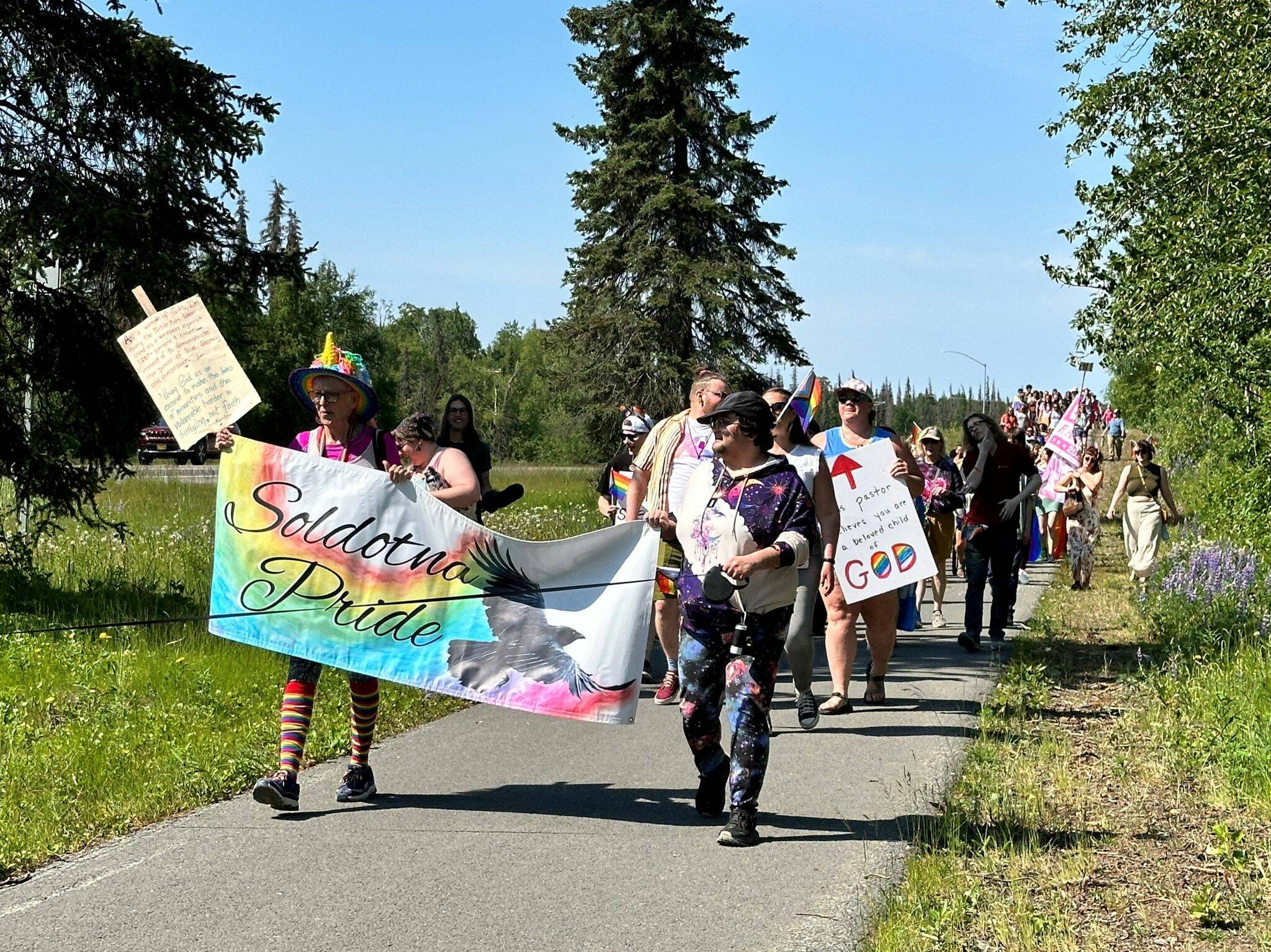 The Two-Spirit March, part of Soldotna Pride’s Pride in the Park, proceeds along Kalifornsky Beach Road in Soldotna, Alaska, on Saturday, June 22, 2024. (Photo by Michele Vasquez, provided by Soldotna Pride)