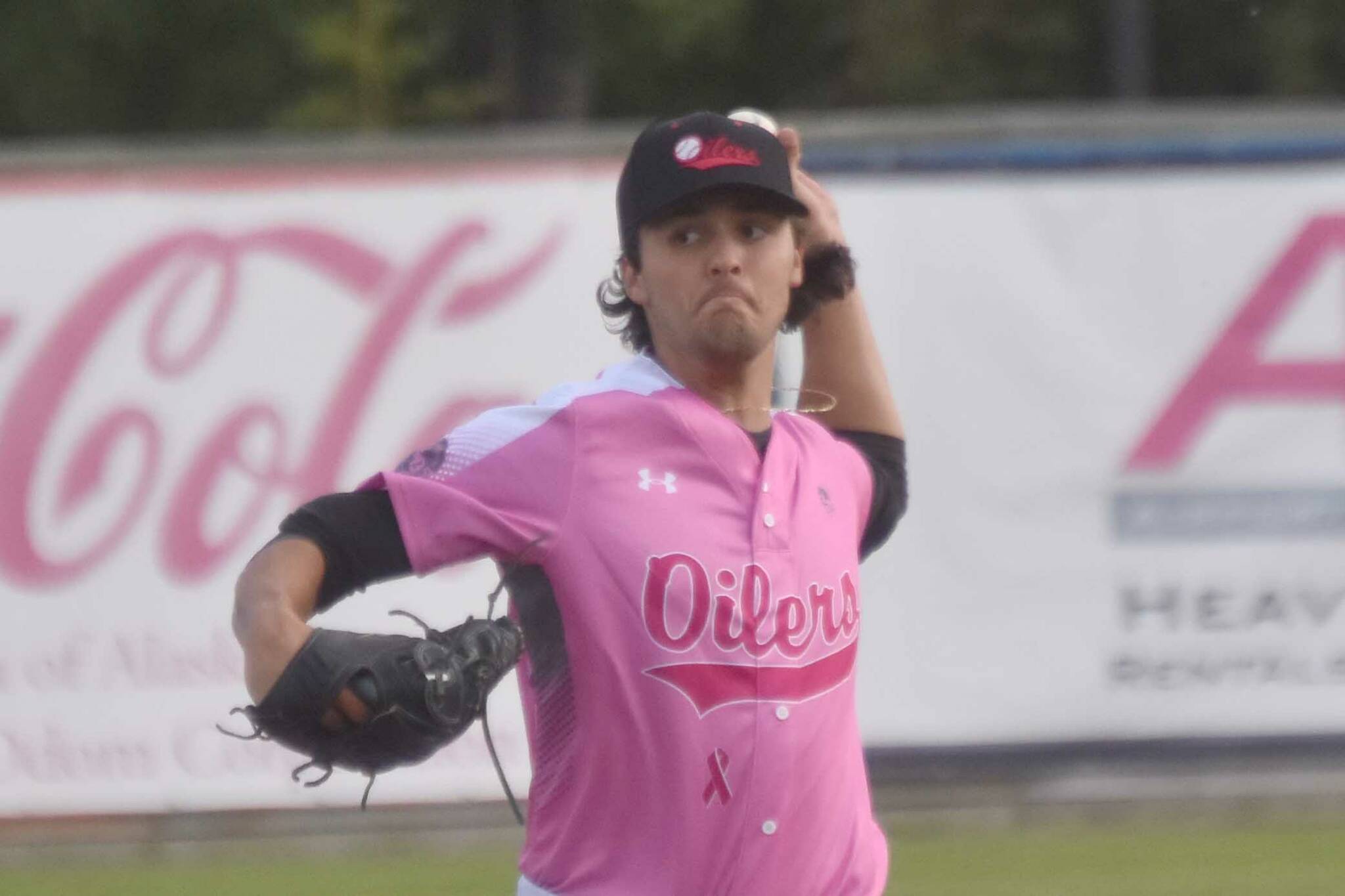 Peninsula Oilers reliever Cameron Teper delivers to the Chugiak-Eagle River Chinooks on Thursday, July 11, 2024, at Coral Seymour Memorial Park in Kenai, Alaska. (Photo by Jeff Helminiak/Peninsula Clarion)