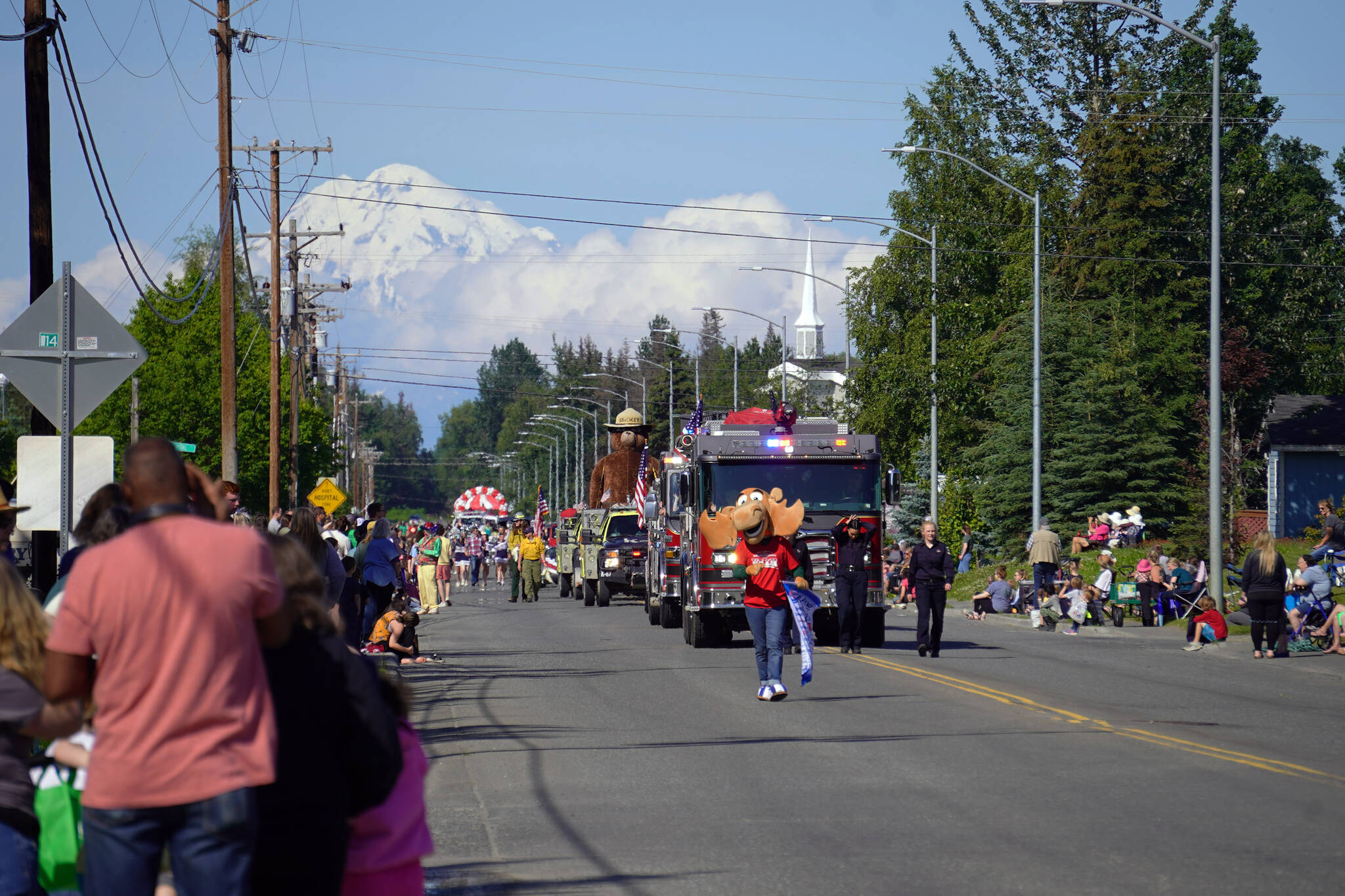The Progress Days Parade proceeds down Marydale Lane in Soldotna, Alaska, on Saturday, July 22, 2023. (Jake Dye/Peninsula Clarion)