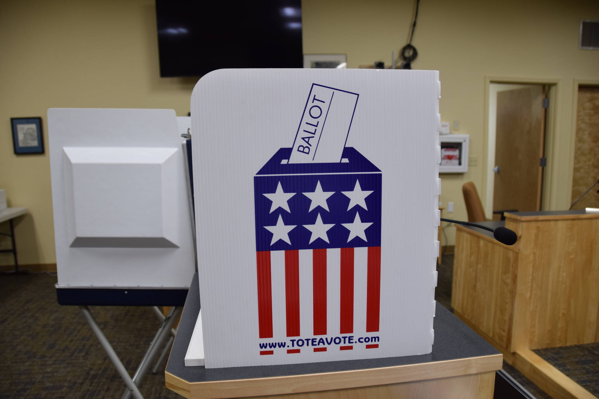 A voting booth for the Kenai Peninsula Borough and City of Homer elections is photographed at Cowles Council Chambers on Tuesday, Oct. 4, 2022, in Homer, Alaska. (Photo by Charlie Menke/ Homer News)