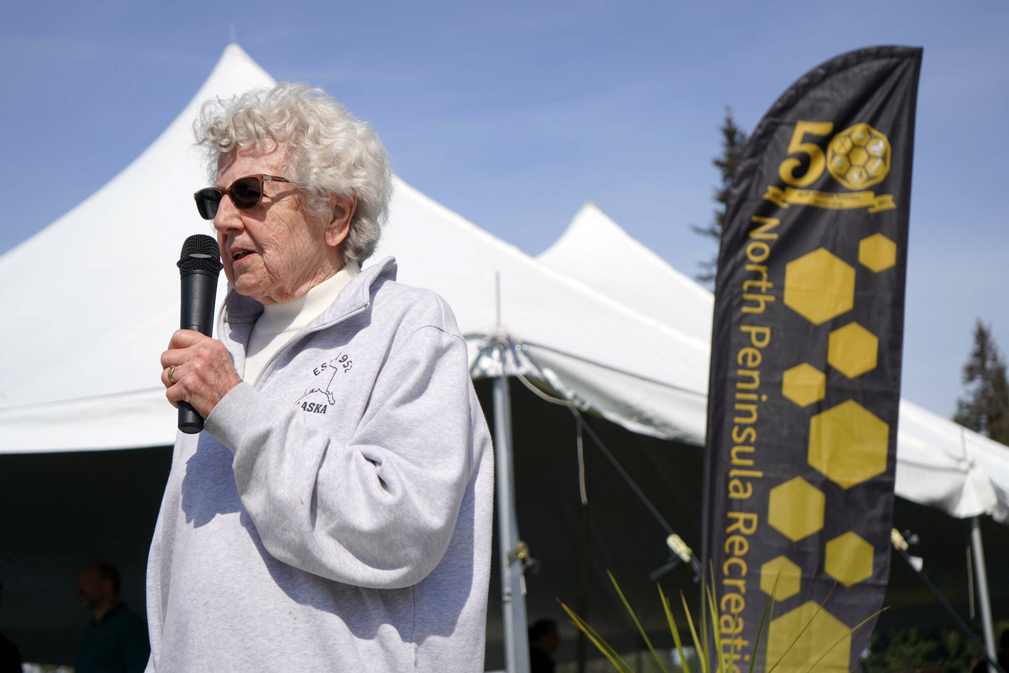 Peggy Arness speaks during a celebration of the 50th anniversary of North Peninsula Recreation Service Area at the Nikiski Pool in Nikiski, Alaska, on Saturday, Aug. 3, 2024. (Jake Dye/Peninsula Clarion)