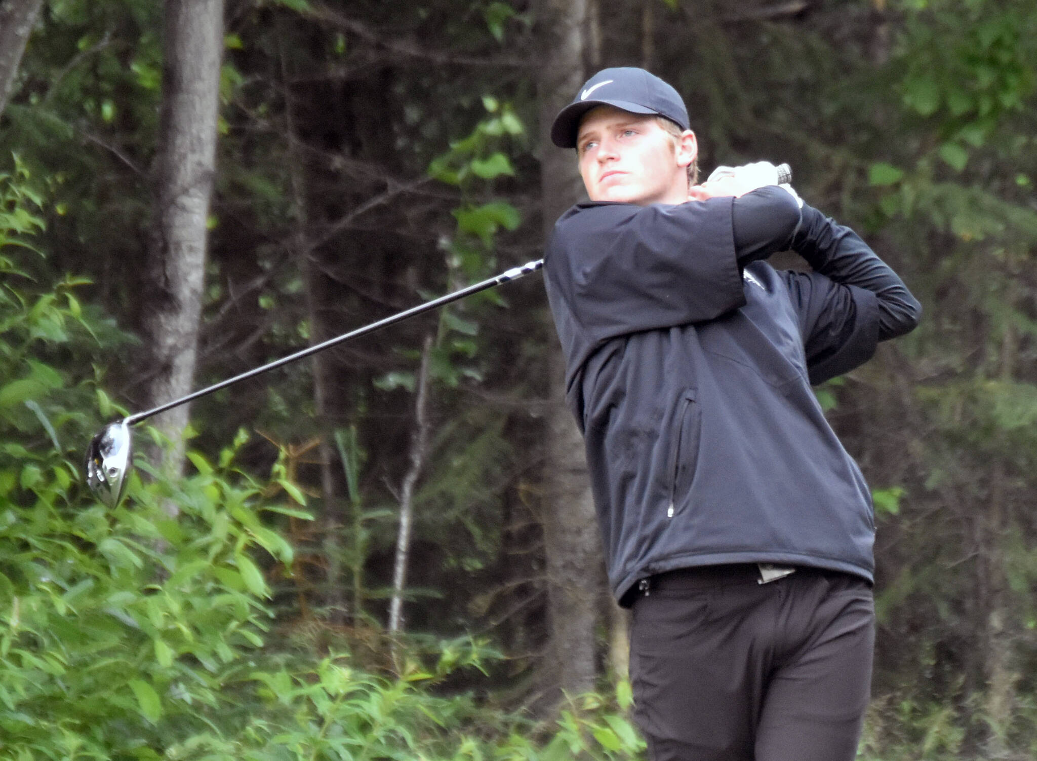 Shane Sundberg tees off on the ninth hole at the State Farm Agent Heith Groth Pro Am and Skins Game on Monday, July 15, 2024, at Birch Ridge Golf Course in Soldotna, Alaska. (Photo by Jeff Helminiak/Peninsula Clarion)