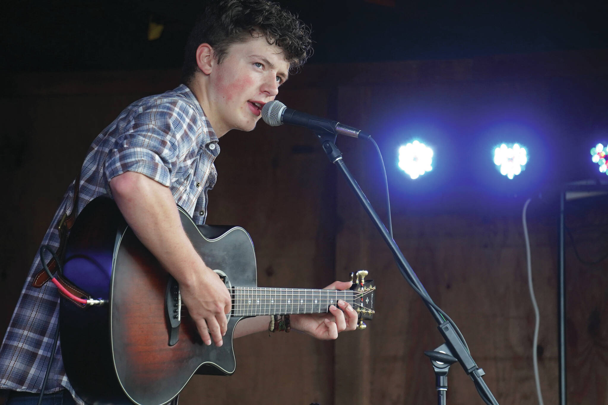 Silas Luke Jones performs on the Ocean Stage at the Kenai Peninsula Fair in Ninilchik, Alaska, on Friday, Aug. 11, 2023. (Jake Dye/Peninsula Clarion)