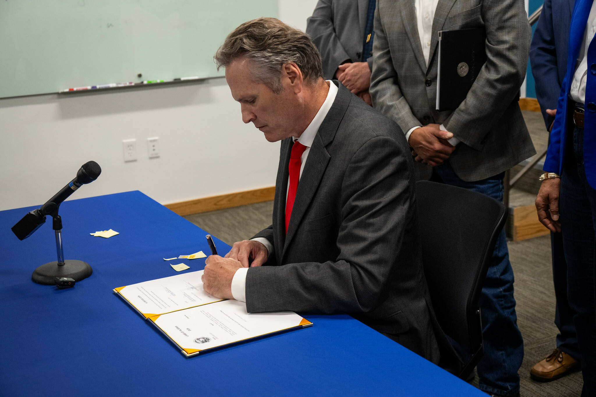 Gov. Mike Dunleavy signs energy bills into law in Anchorage, Alaska, on July 31, 2024. (Provided by the Office of the Governor)