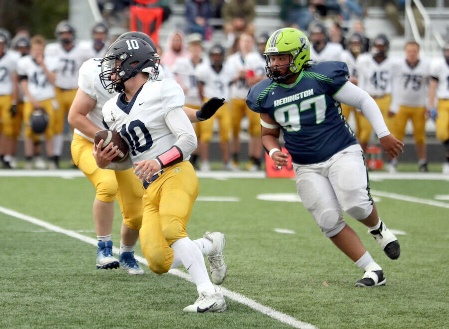 Homer’s Preston Stanislaw carries the ball against Redington on Friday, Aug. 23, 2024, in Wasilla, Alaska. (Photo courtesy of Bruce Eggleston/matsusports.net)