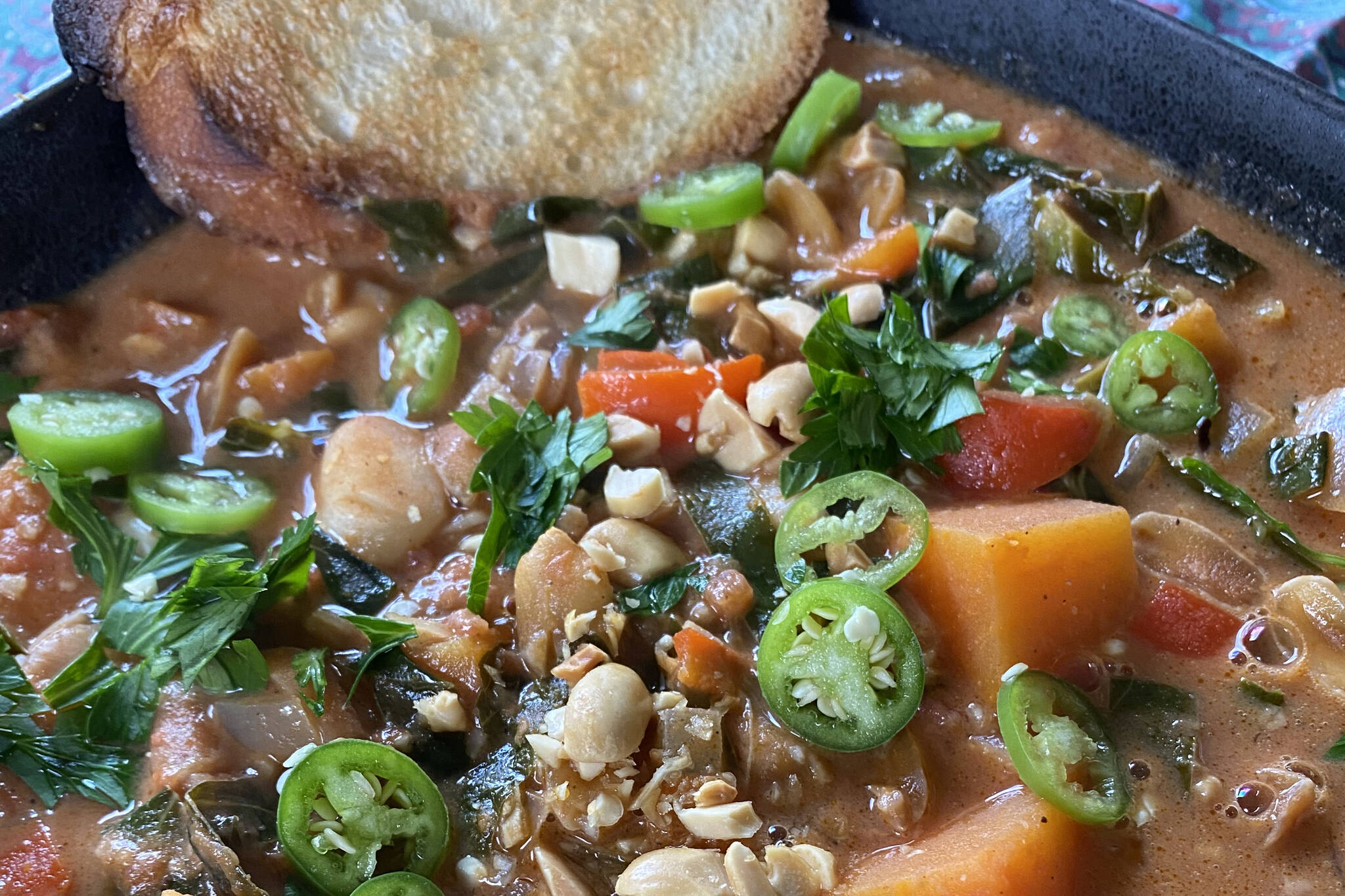 This nutritious and calorie-dense West African Peanut Stew is rich and complex with layers of flavor and depth. (Photo by Tressa Dale/Peninsula Clarion)