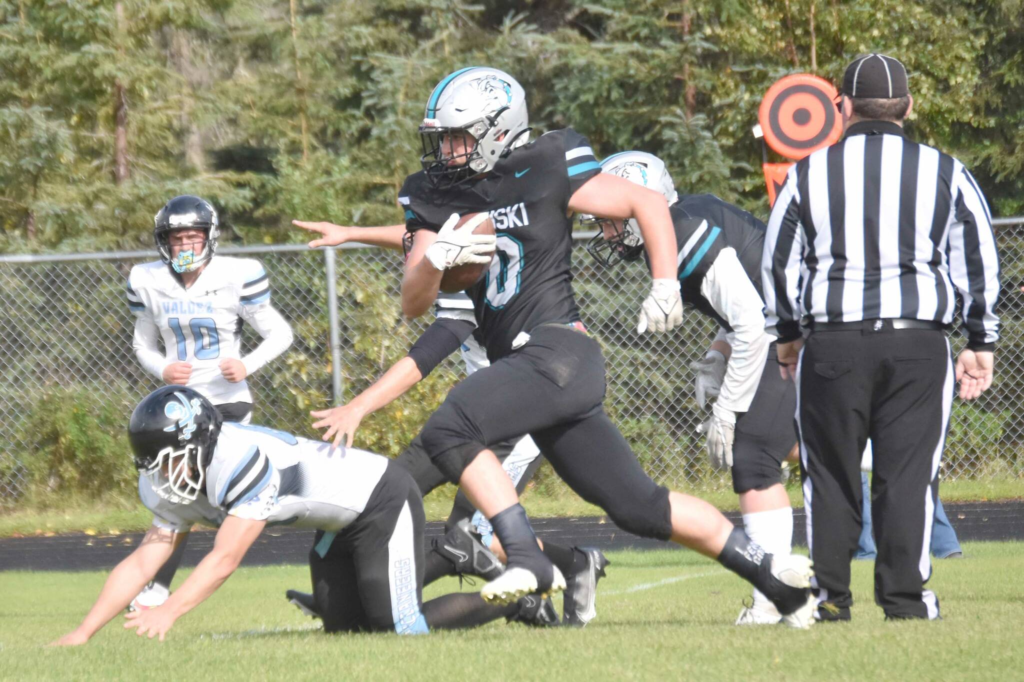 Nikiski's Oliver Parrish rushes for a touchdown against Valdez on Saturday, Aug. 31, 2024, at Nikiski Middle-High School in Nikiski, Alaska. (Photo by Jeff Helminiak/Peninsula Clarion)